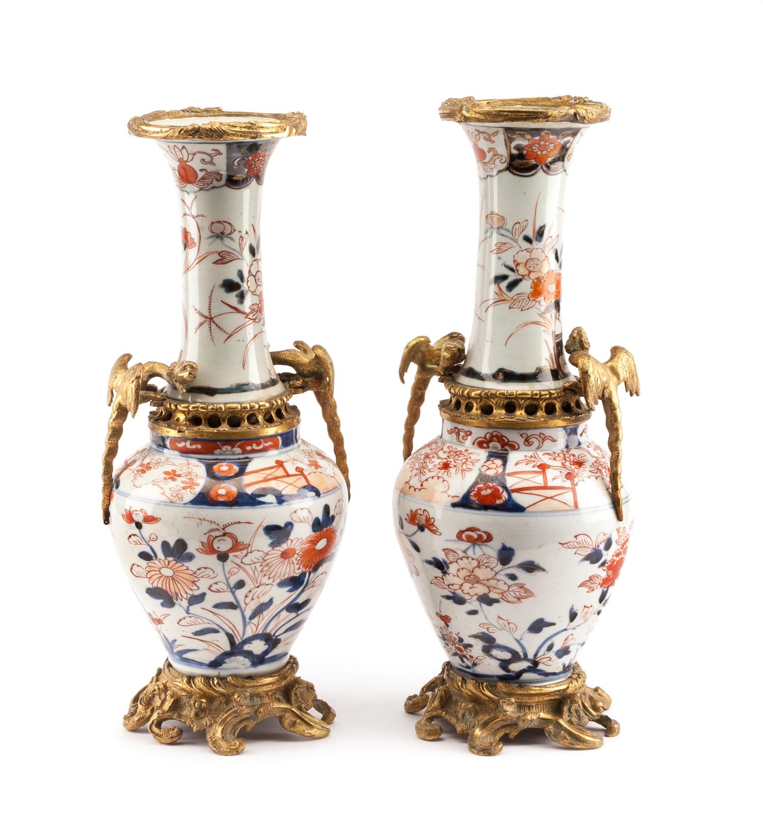 A Pair of Japanese Gilt Bronze Mounted Imari Porcelain Vases Height 16 inches.
