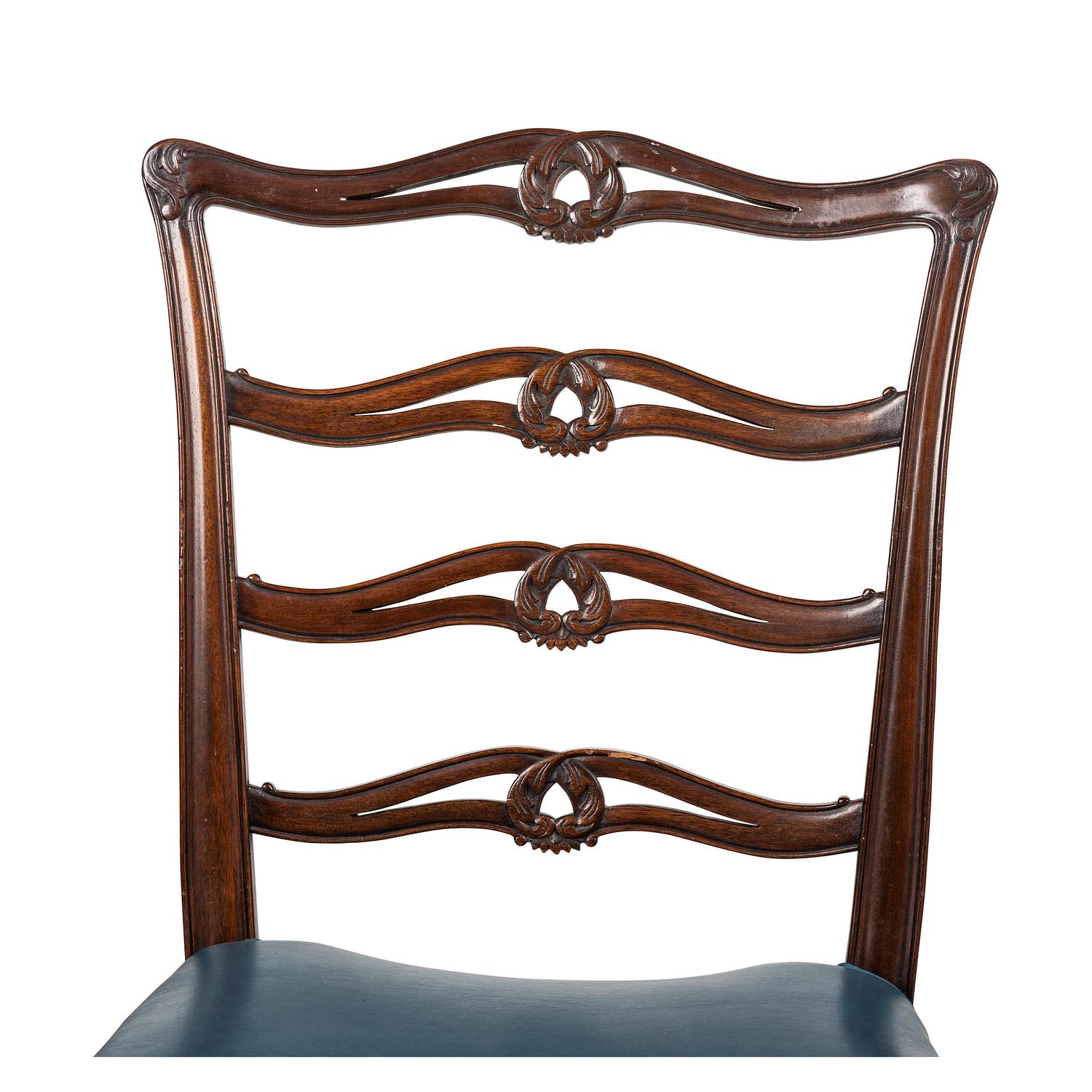 A Set of Four Early Federal Carved Mahogany Ladderback Side Chairs