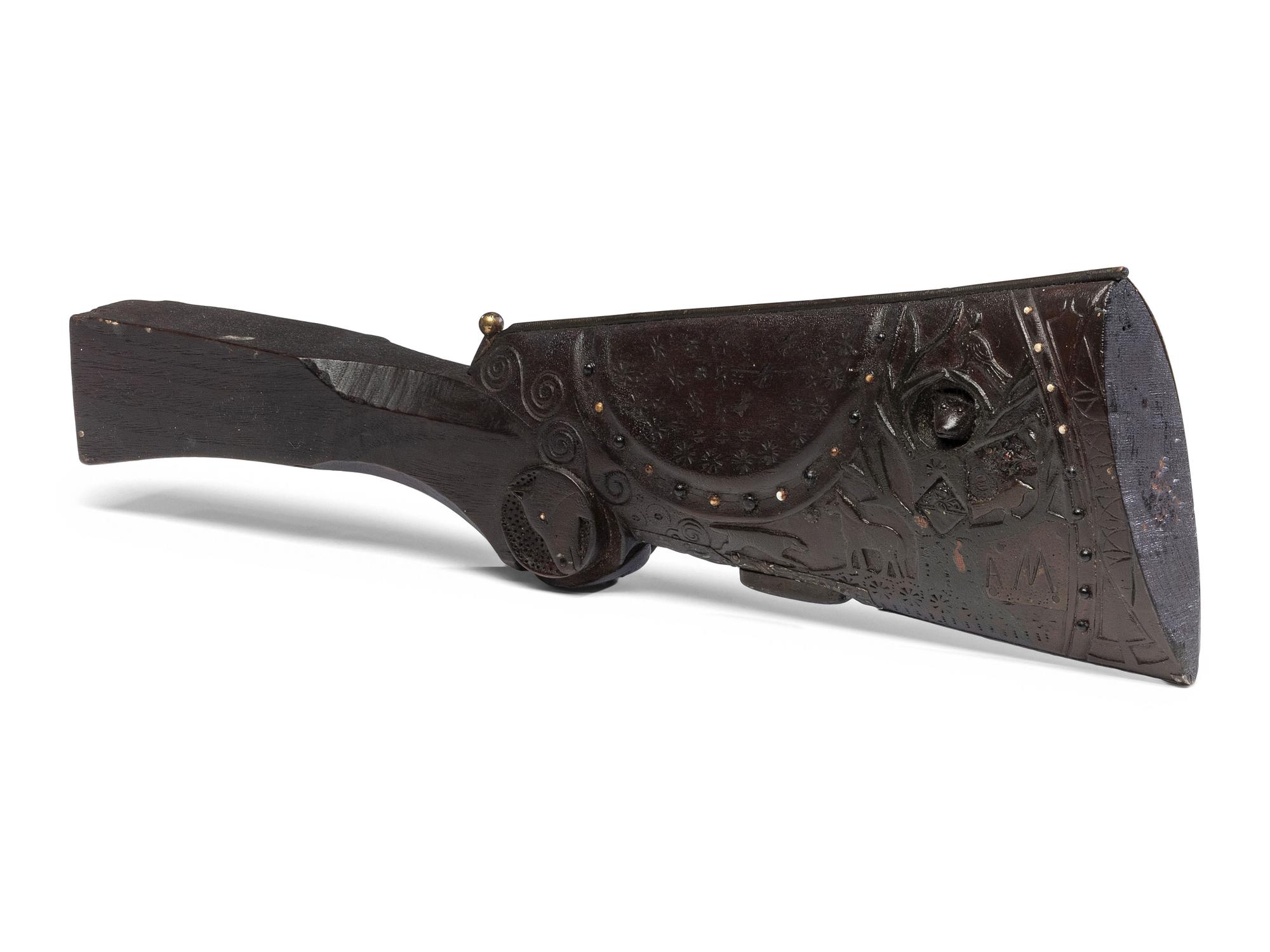 A Folk Art Carved and Punch Decorated Painted Ash Rifle Stock