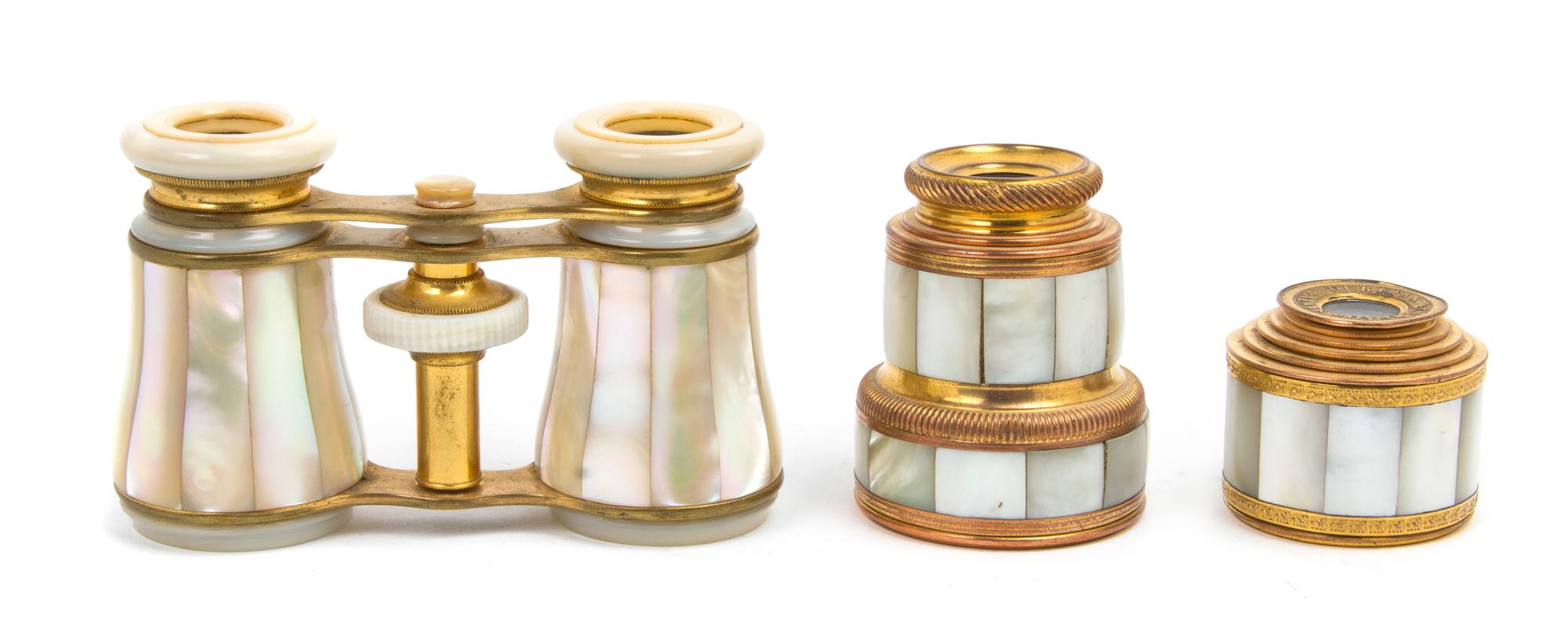 A Pair of French Mother-of-Pearl Veneered Opera Glasses, Width of first 3 7/8 inches.