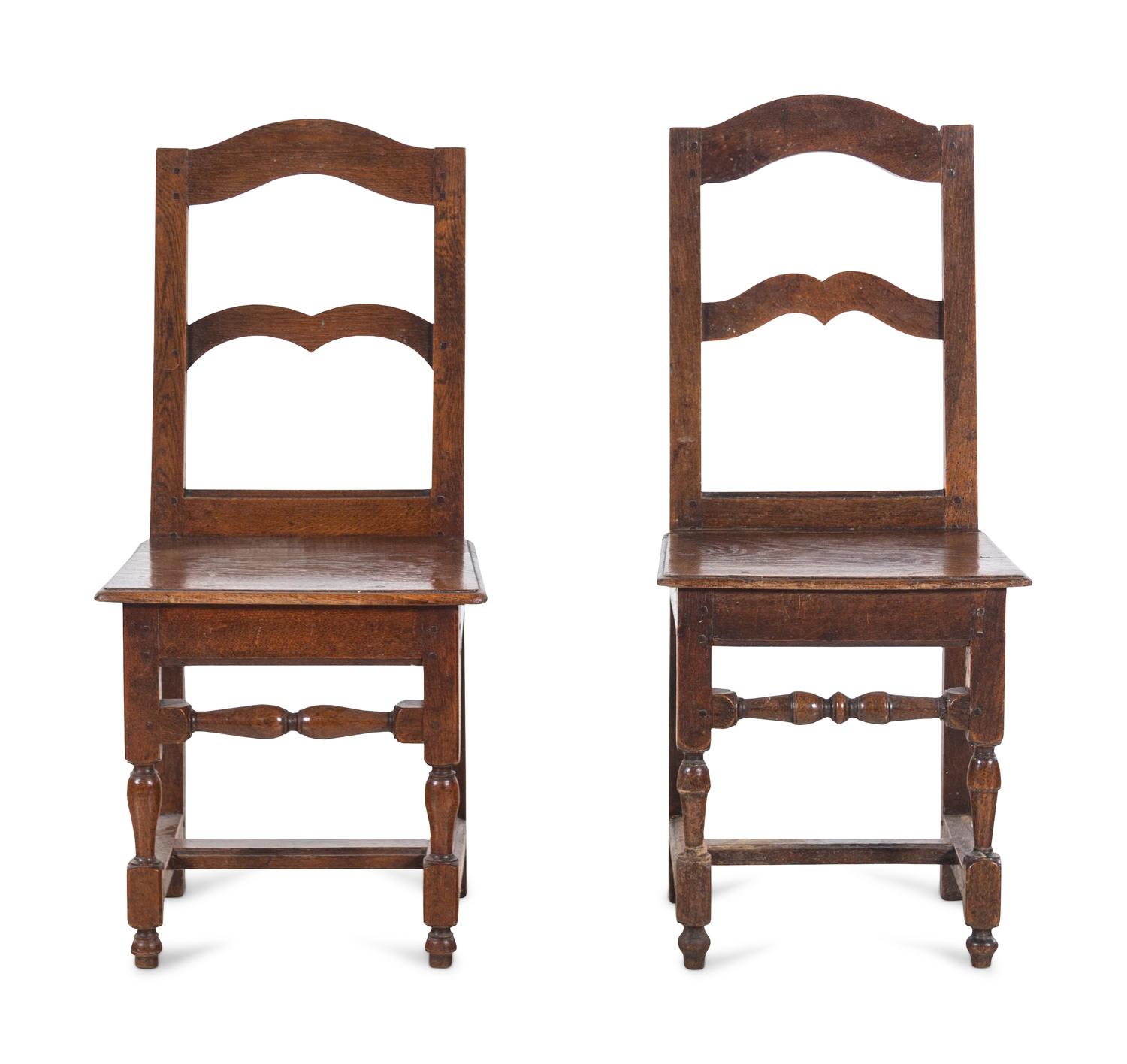 A Near Pair of Provincial Oak Chairs with Plank Seats