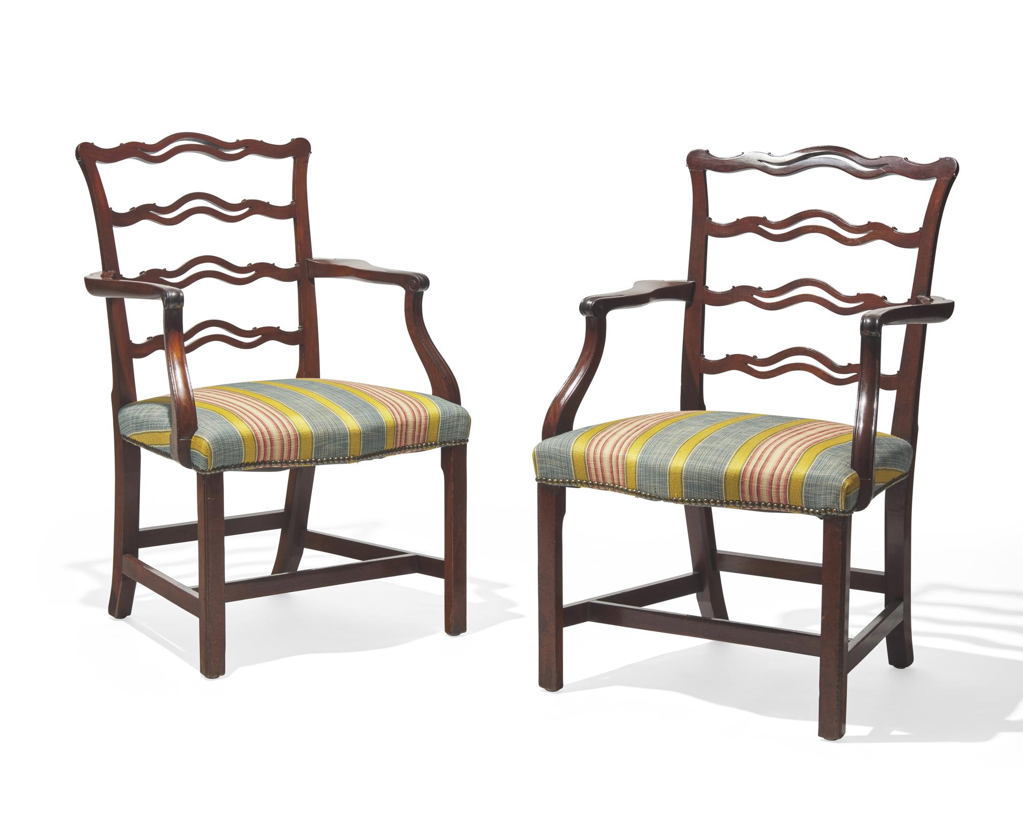 A pair of George III ribbon-back mahogany armchairs, late 18th / 19th century