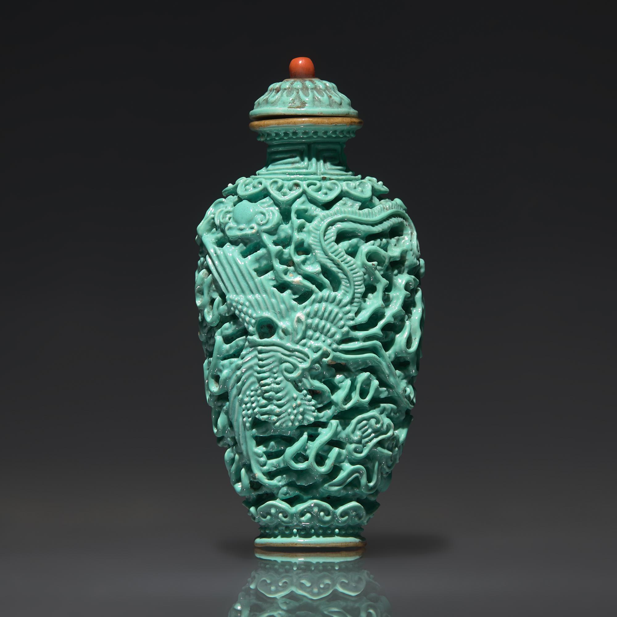 A Chinese Turquoise-Glazed Molded "Dragon and Phoenix" Snuff Bottle, Qing Dynasty, Jiaqing Period — 清嘉慶 松石釉模印龍鳳紋鼻煙壺