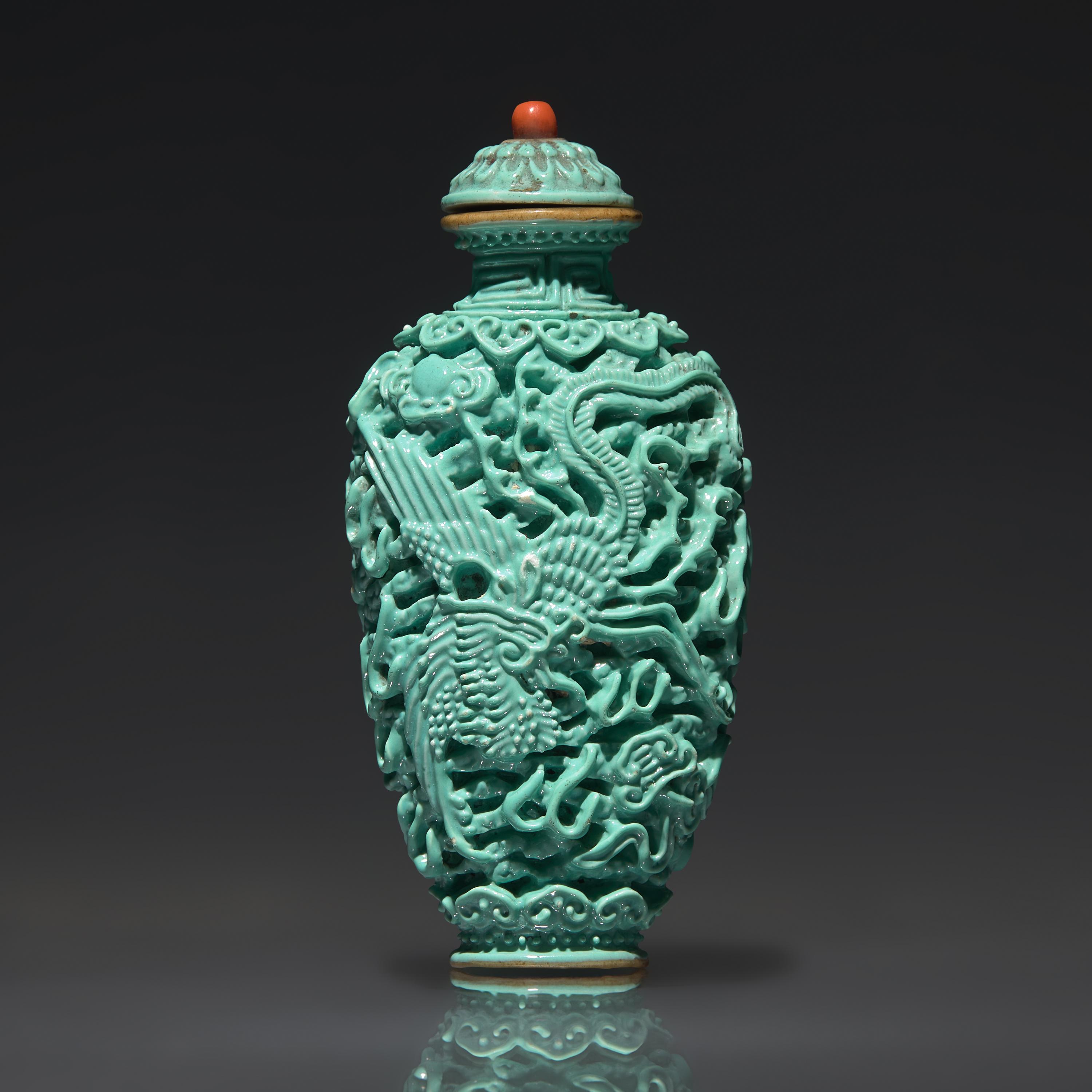 A Chinese Turquoise-Glazed Molded "Dragon and Phoenix" Snuff Bottle, Qing Dynasty, Jiaqing Period — 清嘉慶 松石釉模印龍鳳紋鼻煙壺