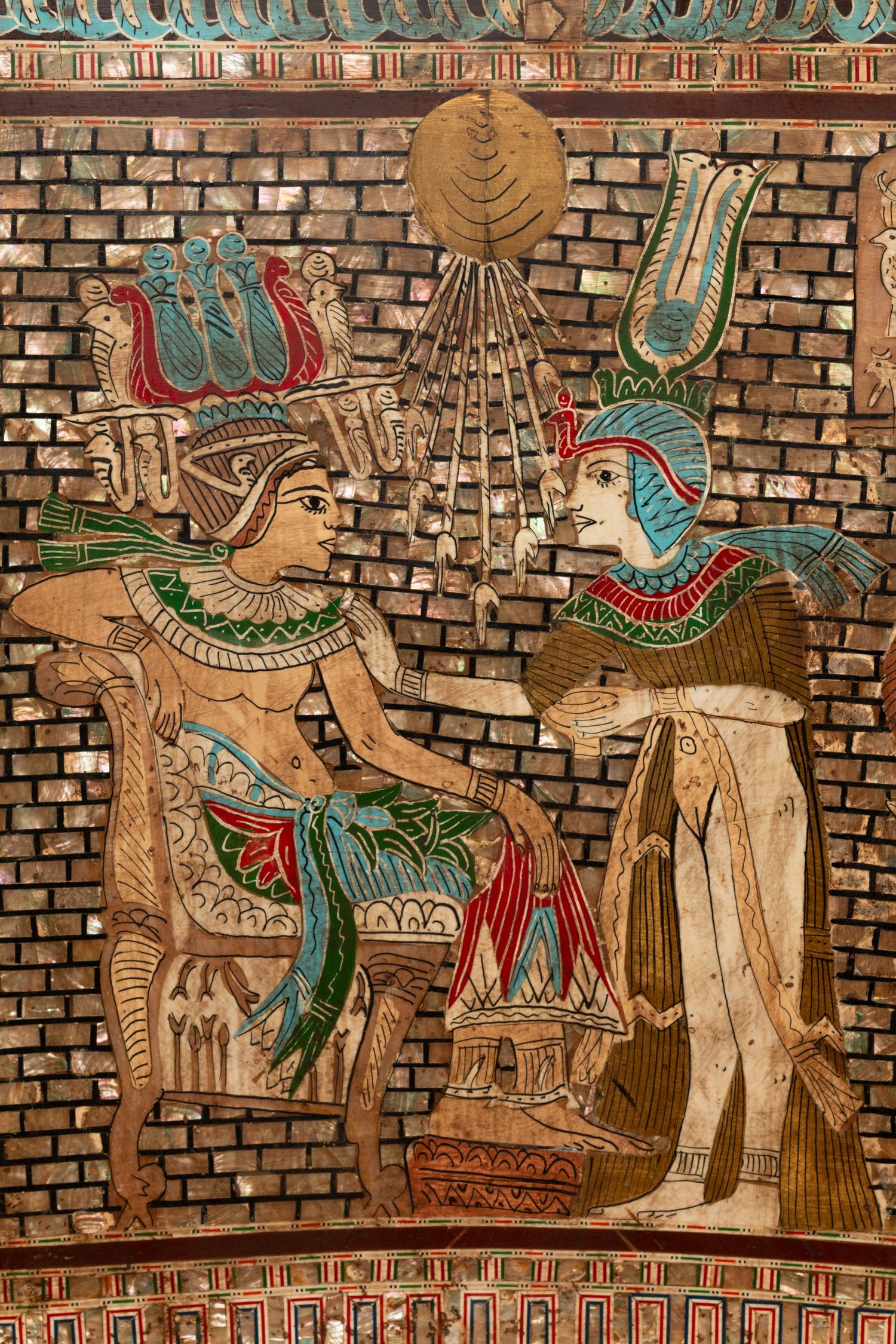 An Egyptian Style Parcel Gilt and Inlaid Throne Chair