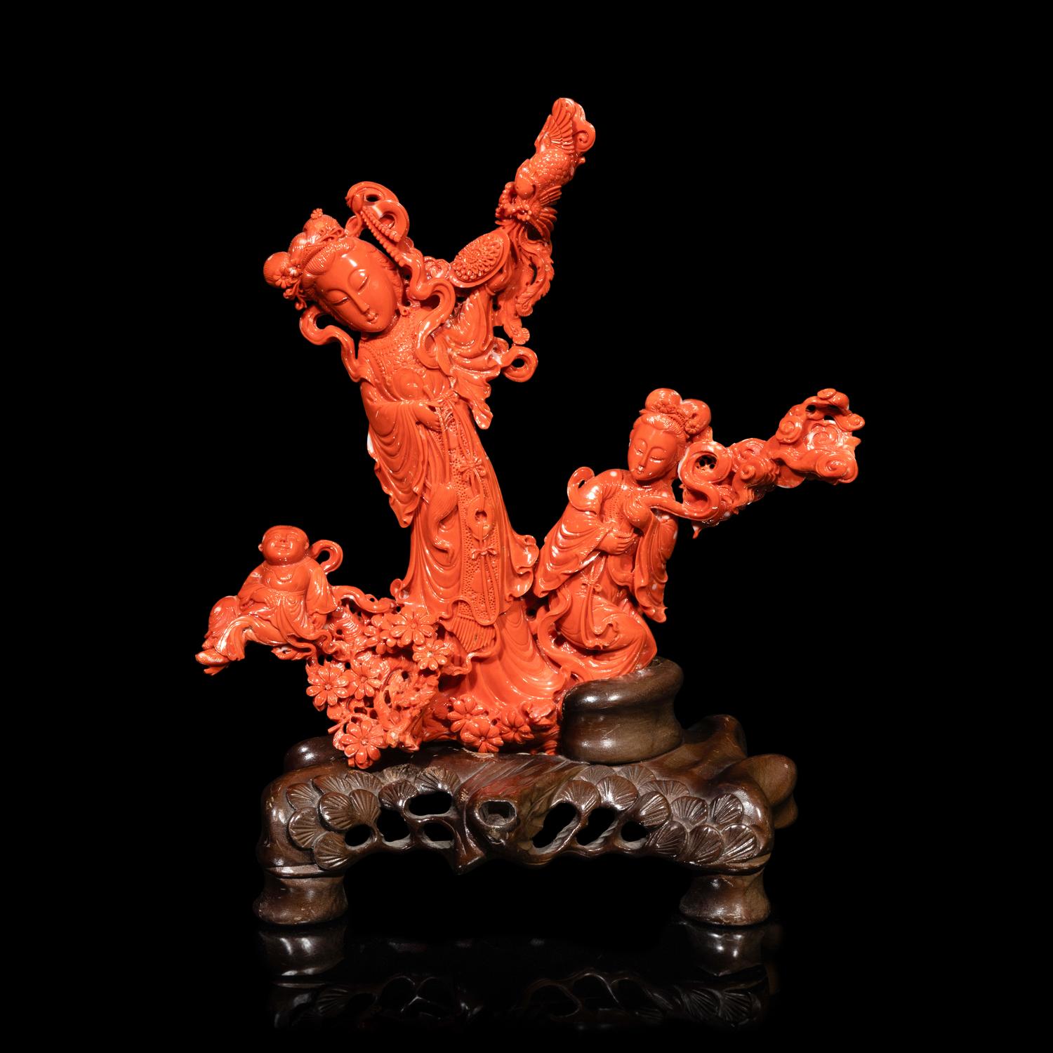 A Large Chinese Red Coral Carving, 20th Century 近代 紅珊瑚雕天女散花連木座