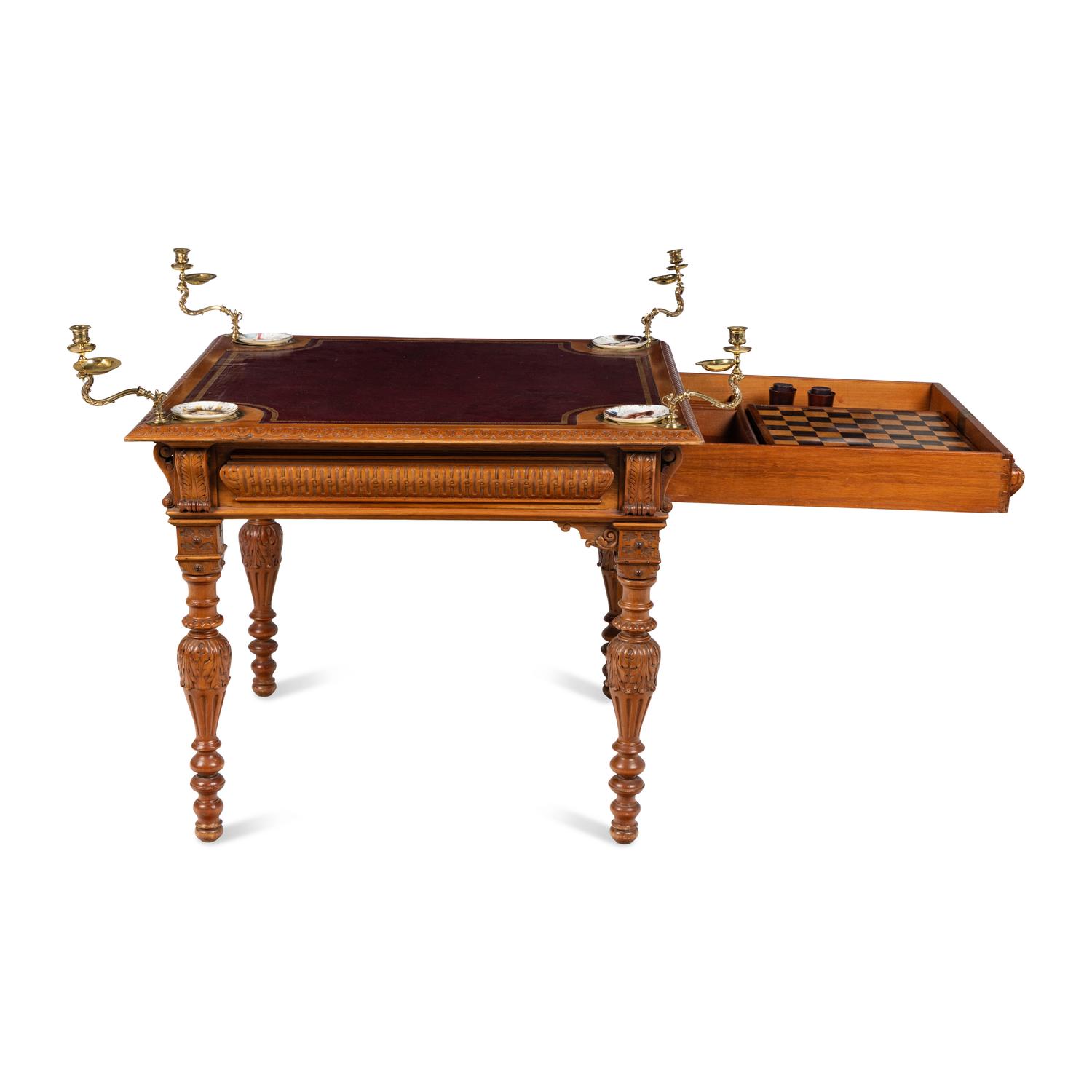 An Edwardian Oak Game Table