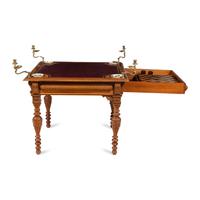 An Edwardian Oak Game Table