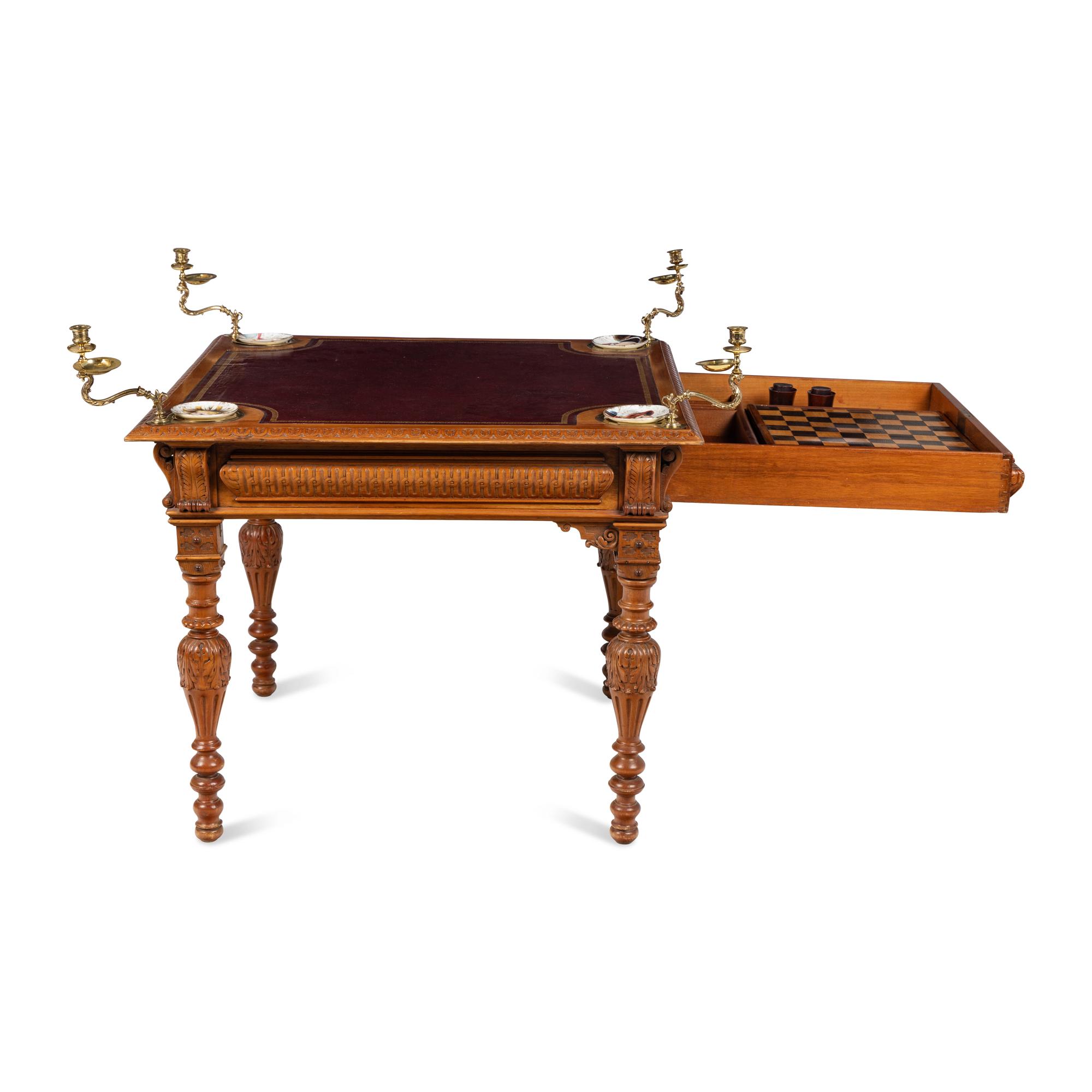 An Edwardian Oak Game Table