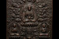 A Copper Plated Buddha Wall Hanging