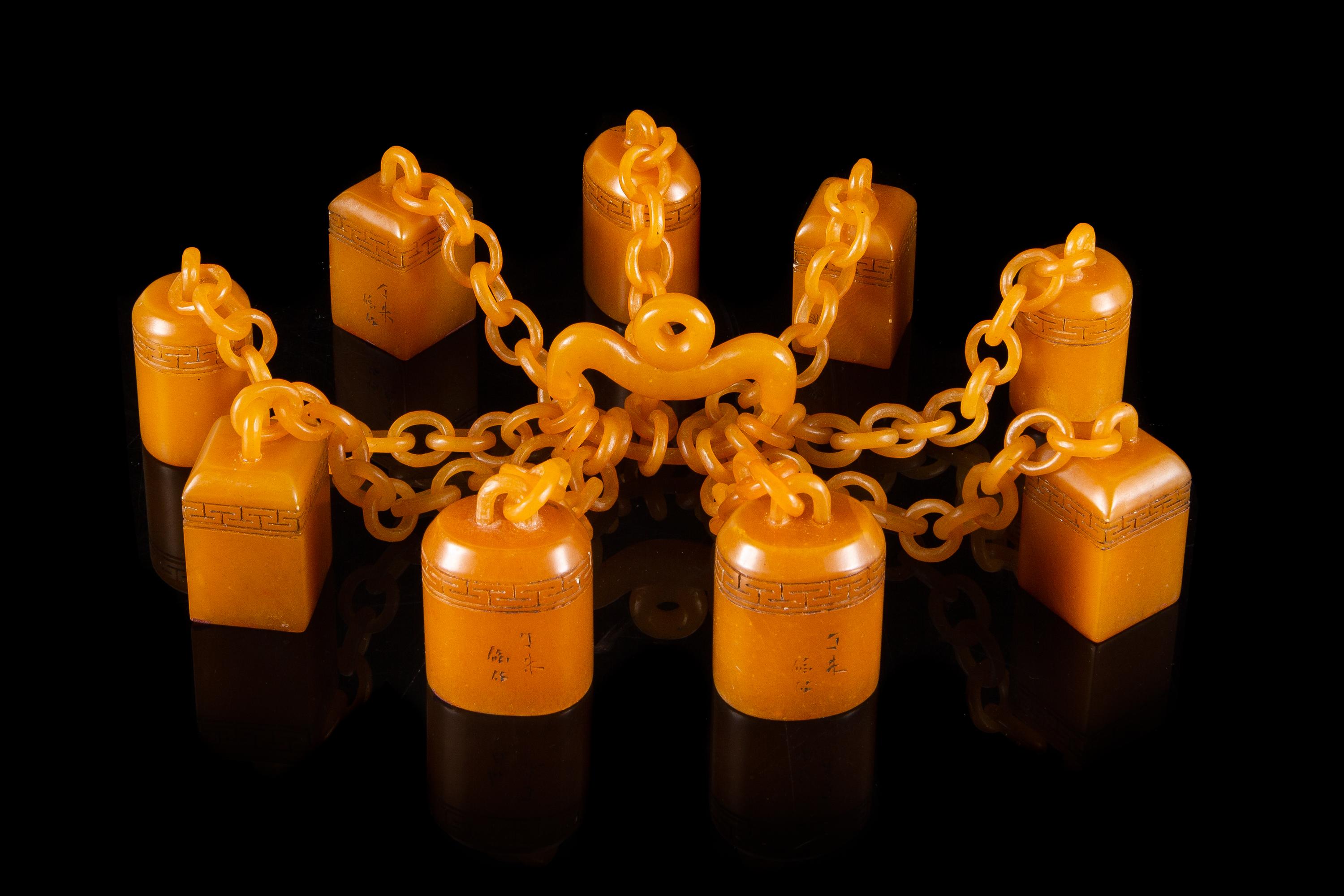 A Set of Nine Carved Yellow Soapstone Seals Height of tallest 1 3/4 inches.