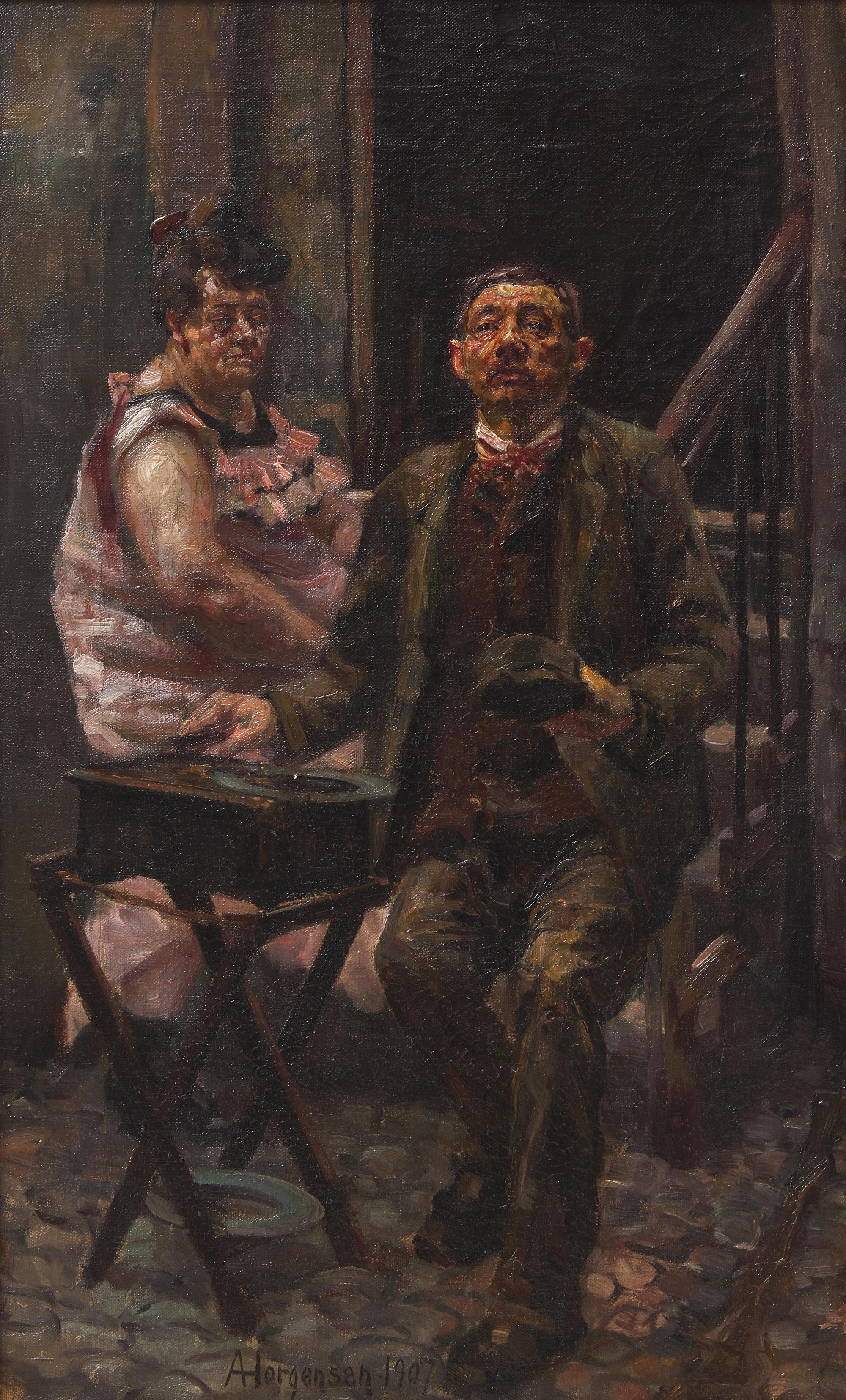 Organ grinder with lady sitting in a staircase in Holmensgade , 1907