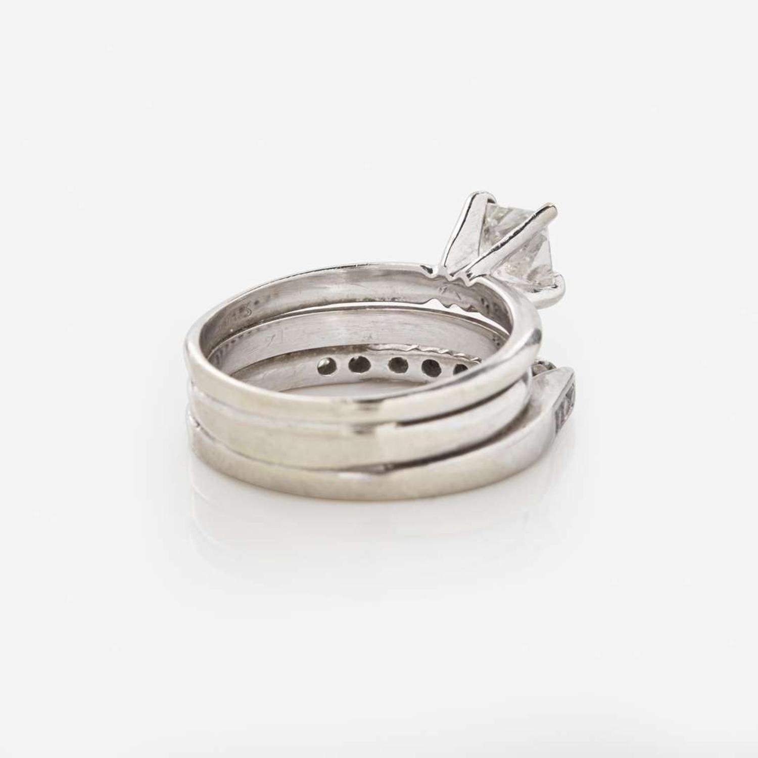 A 14K White Gold and Diamond Ring