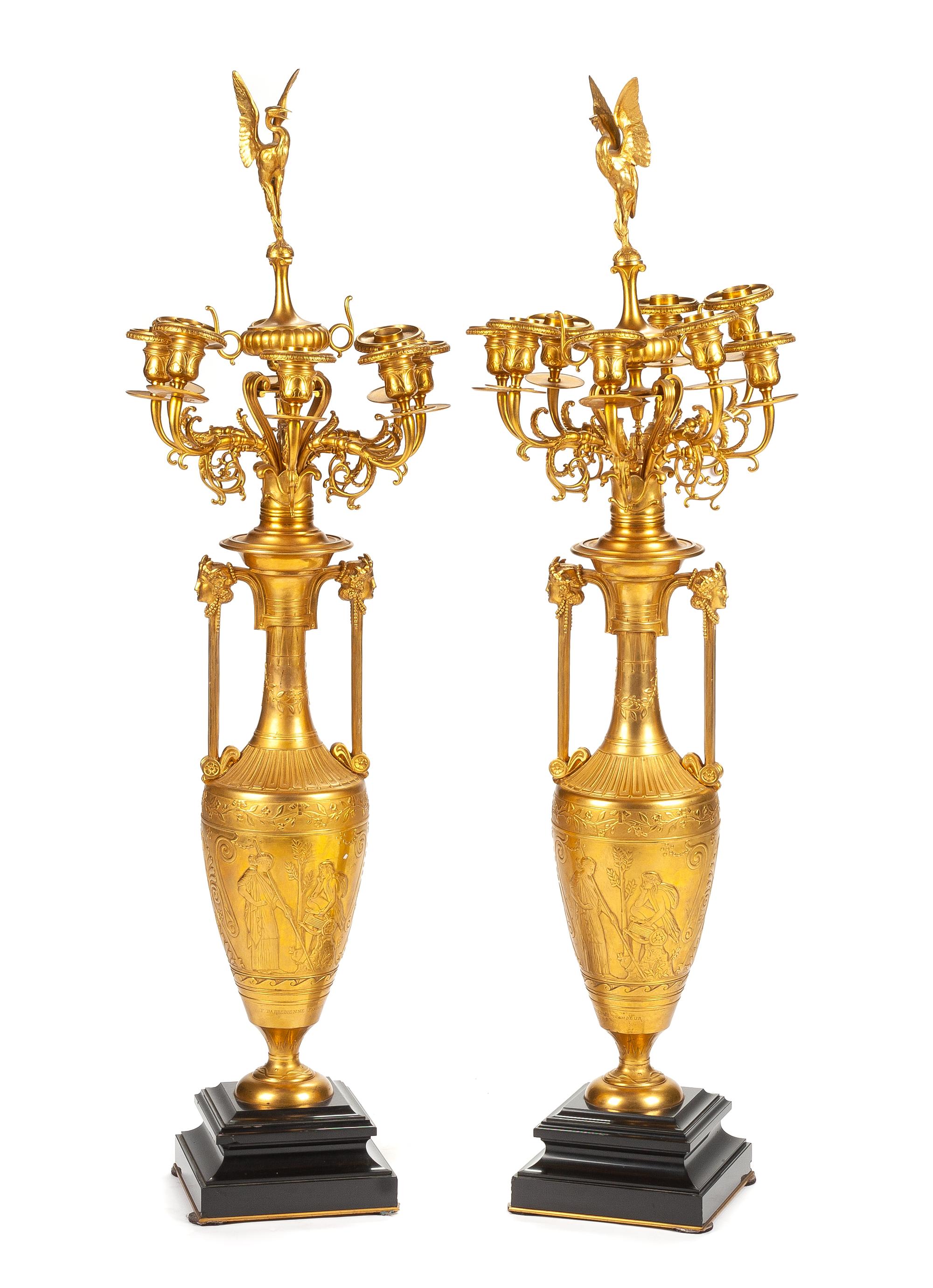 A Pair of French Neoclassical Gilt Bronze Eight-Light Candelabra Height overall 41 3/4 inches. — 19TH CENTURY