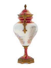 A Gilt Metal Mounted Sèvres Style Porcelain Urn