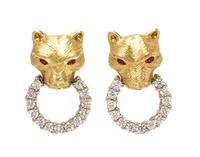 A Pair of 18 Karat Bicolor Gold and Diamond Lioness Earclips, 13.30 dwts.
