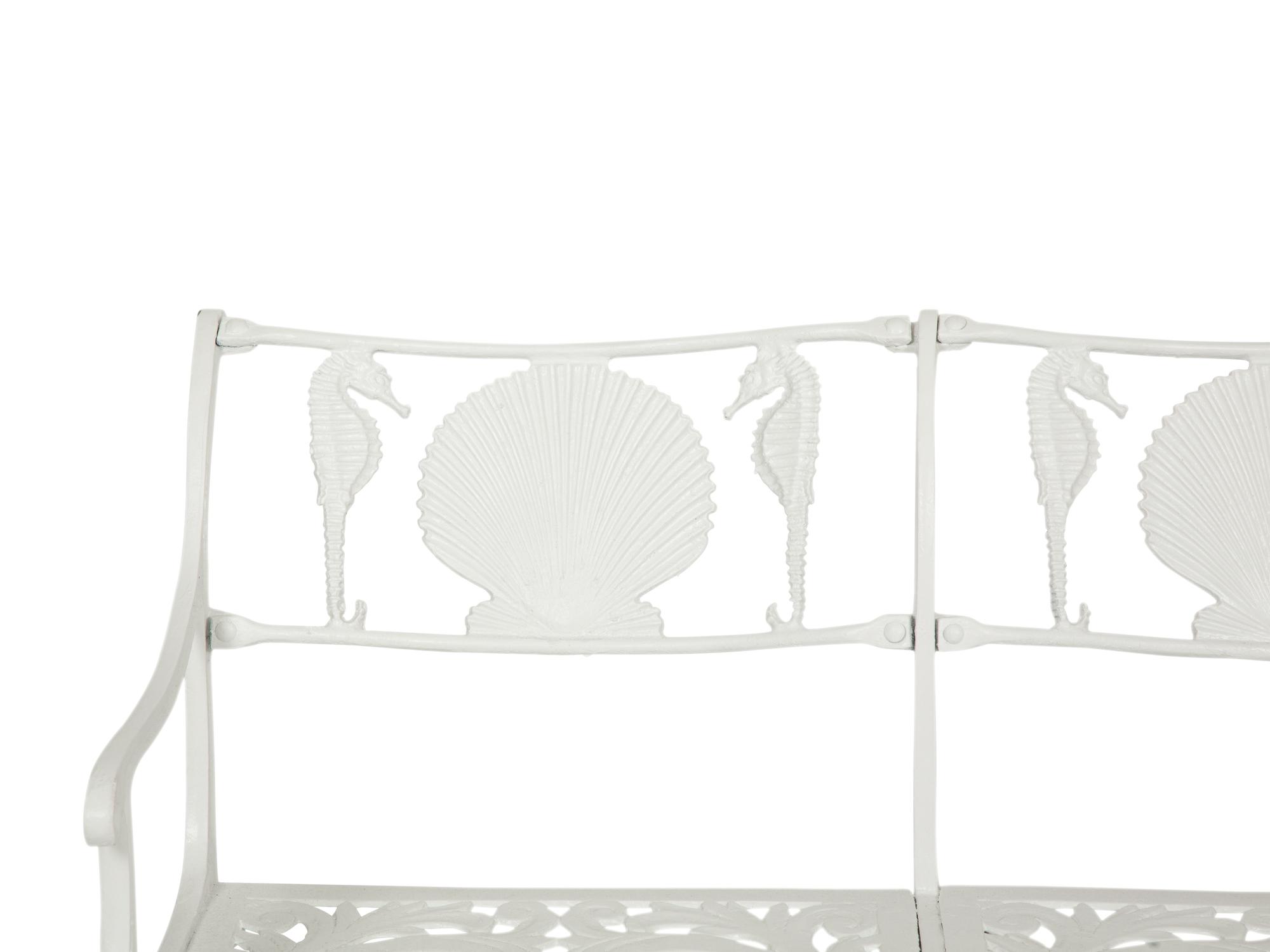 A Suite of White-Painted Cast Metal Garden Furniture