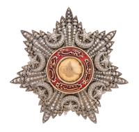 An Ottoman Silver and Enamel Military Order Badge Width 3 1/4 inches.