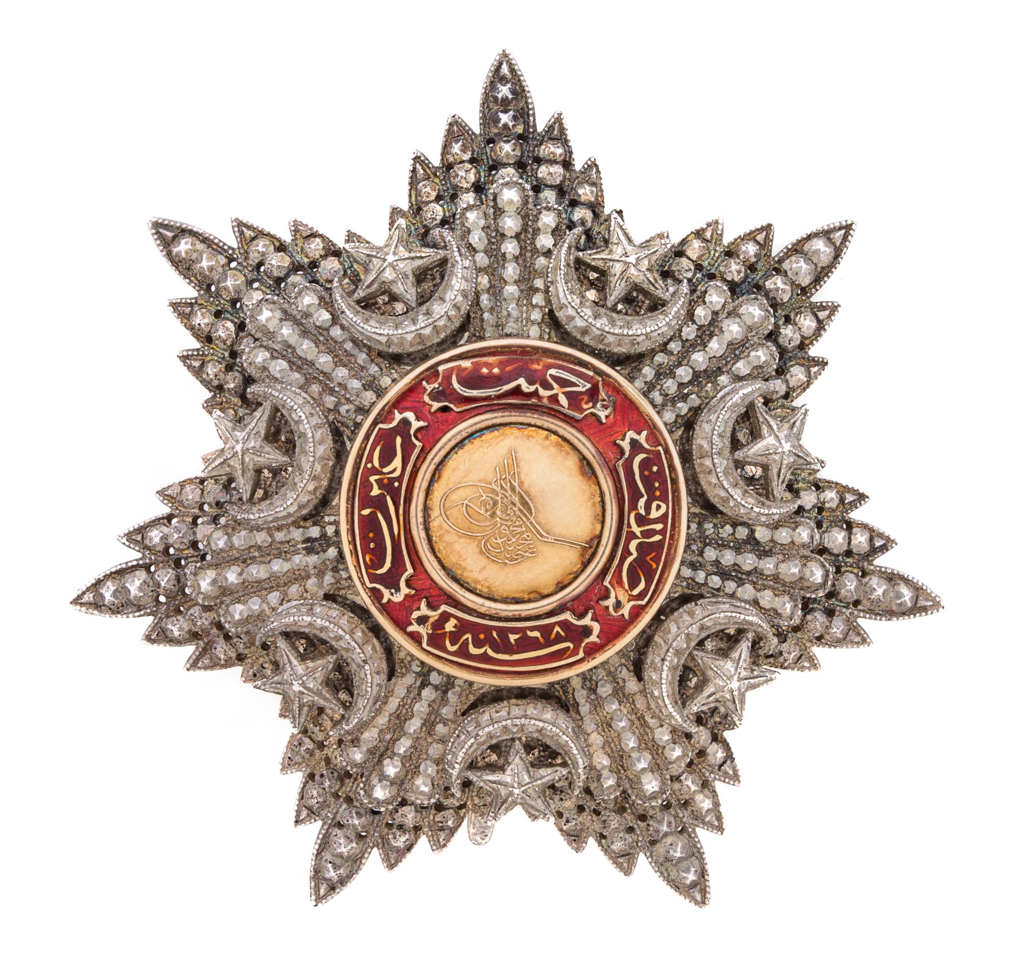 An Ottoman Silver and Enamel Military Order Badge Width 3 1/4 inches.