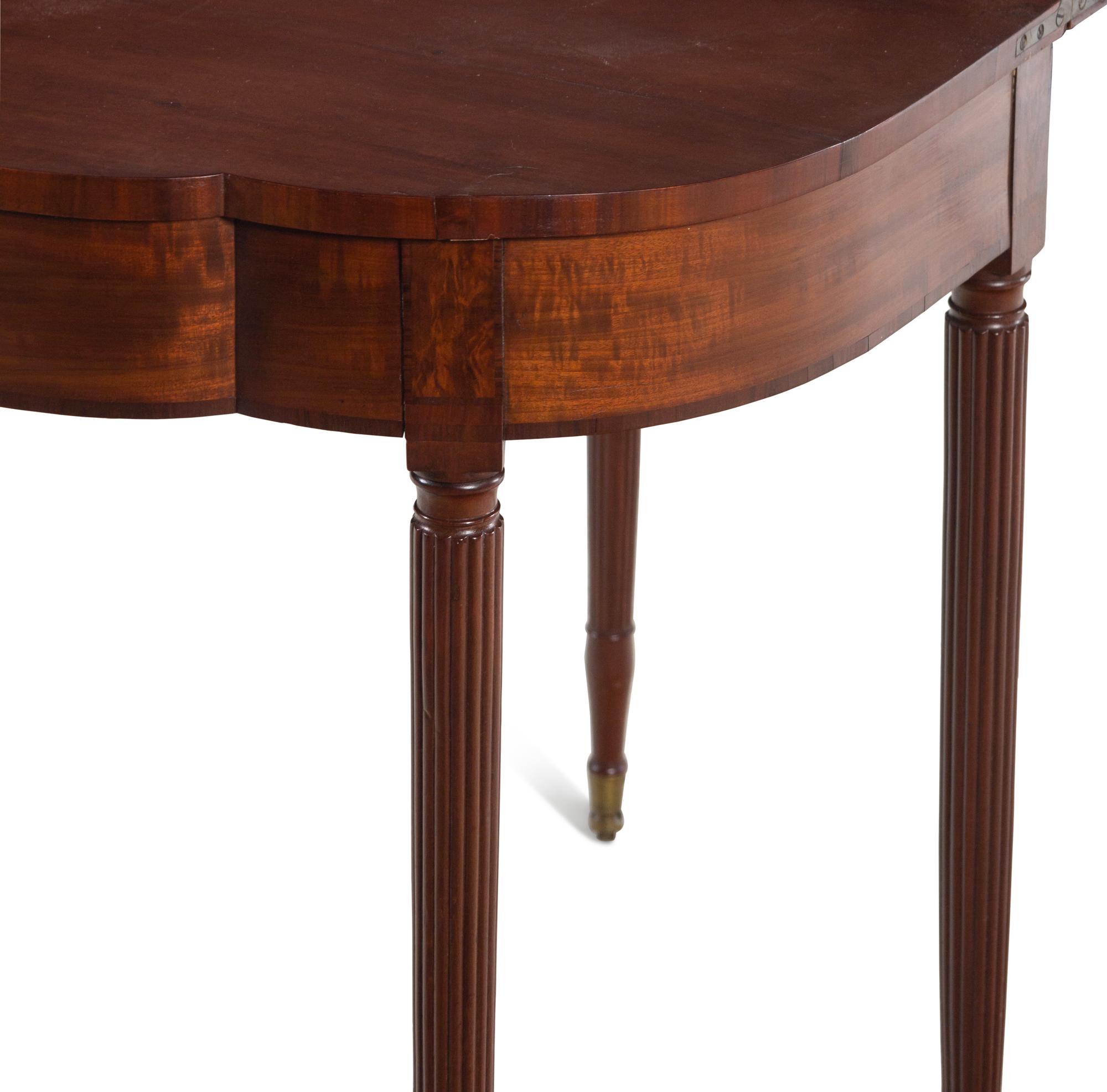 A Federal Figured Mahogany Lobed Top Five-Legged Game Table