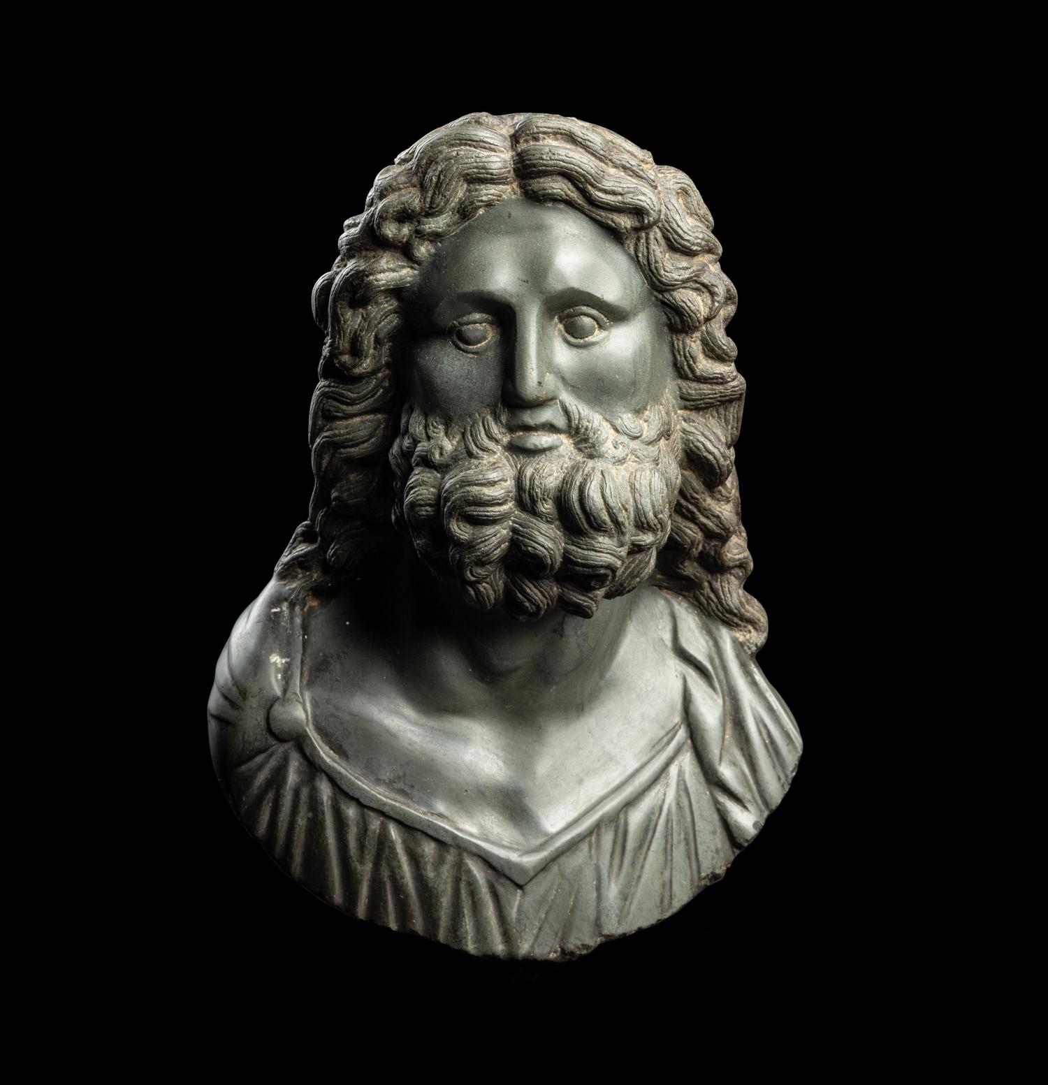 A Roman Green Schist Bust of Jupiter