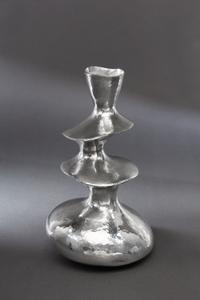 A Contemporary English Silver Vase, Hiroshi Suzuki, Sheffield, 2002, of three tiered from with a spot-hammered finish throughout.