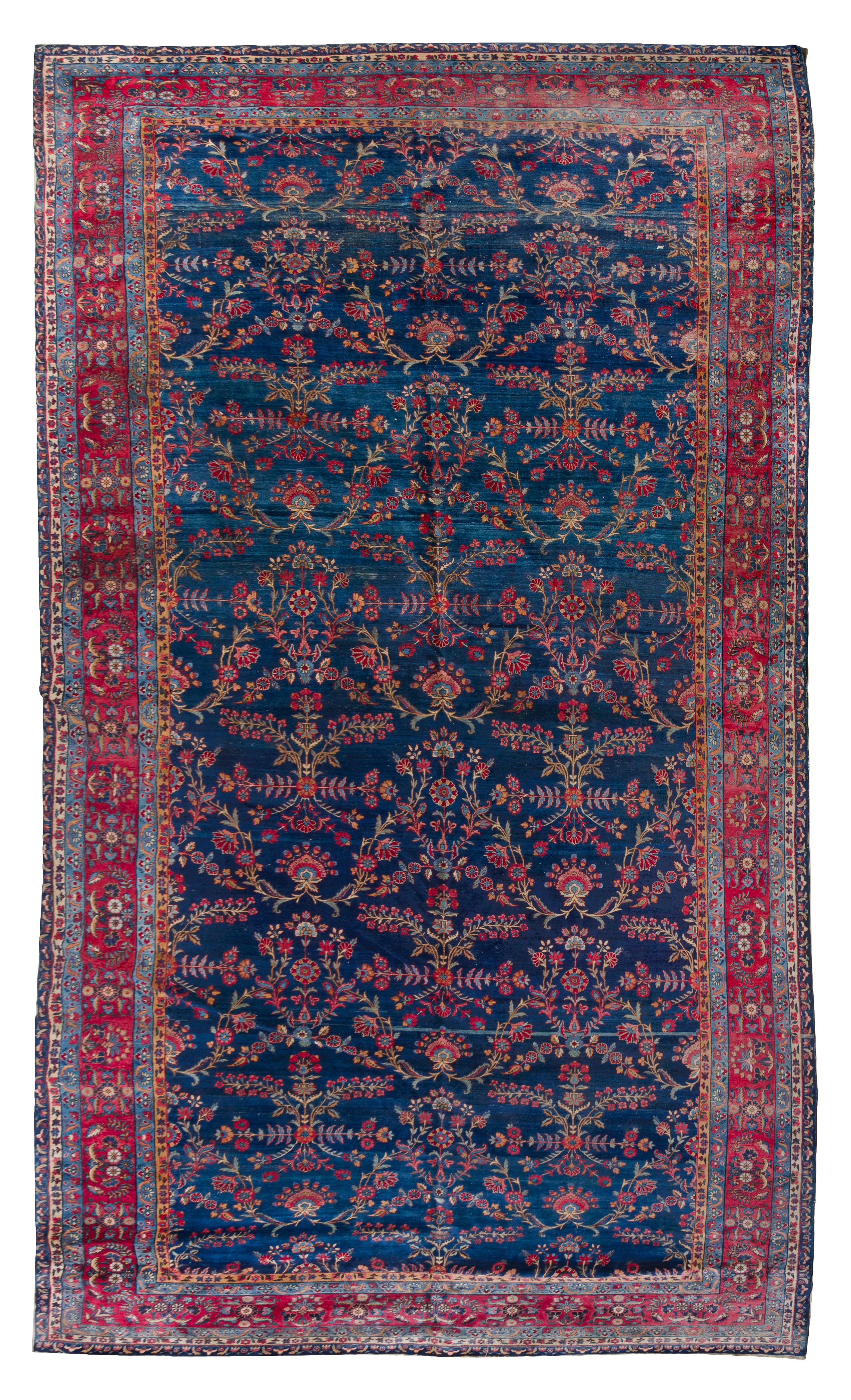A Sarouk Wool Rug 16 feet 11 inches x 8 feet 10 inches.