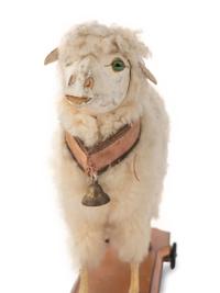 A Small Leather, Wool and Glass Inset Vocal Sheep Pull Toy