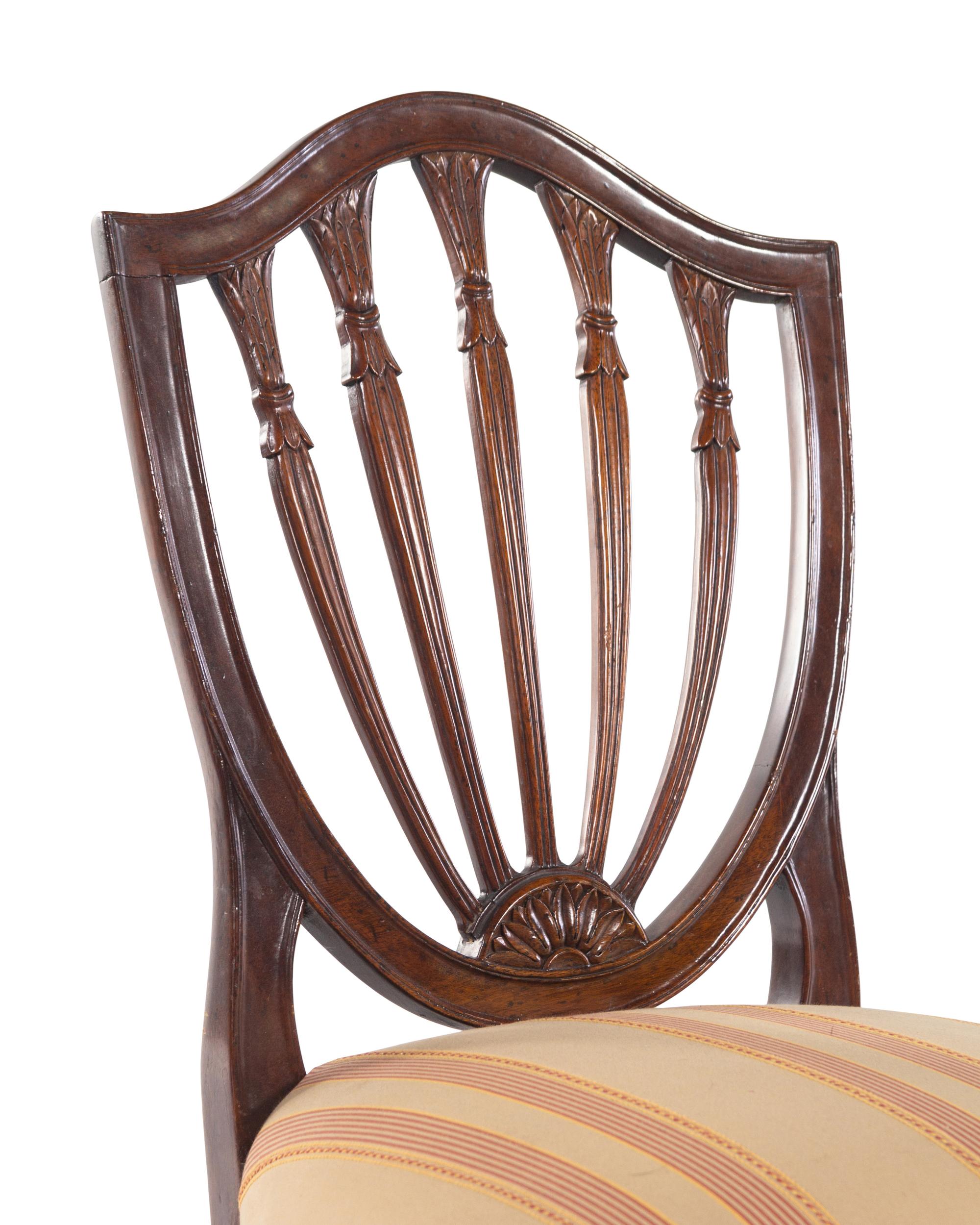 A Set of Nine George III Mahogany Dining Chairs