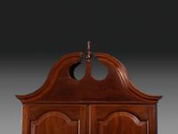 A Chippendale Figured Mahogany Bonnet Top Desk-and-Bookcase