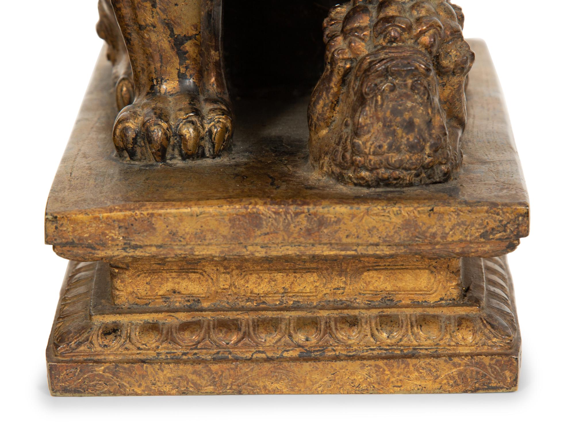 A Pair of Gilt Bronze Fu Lions