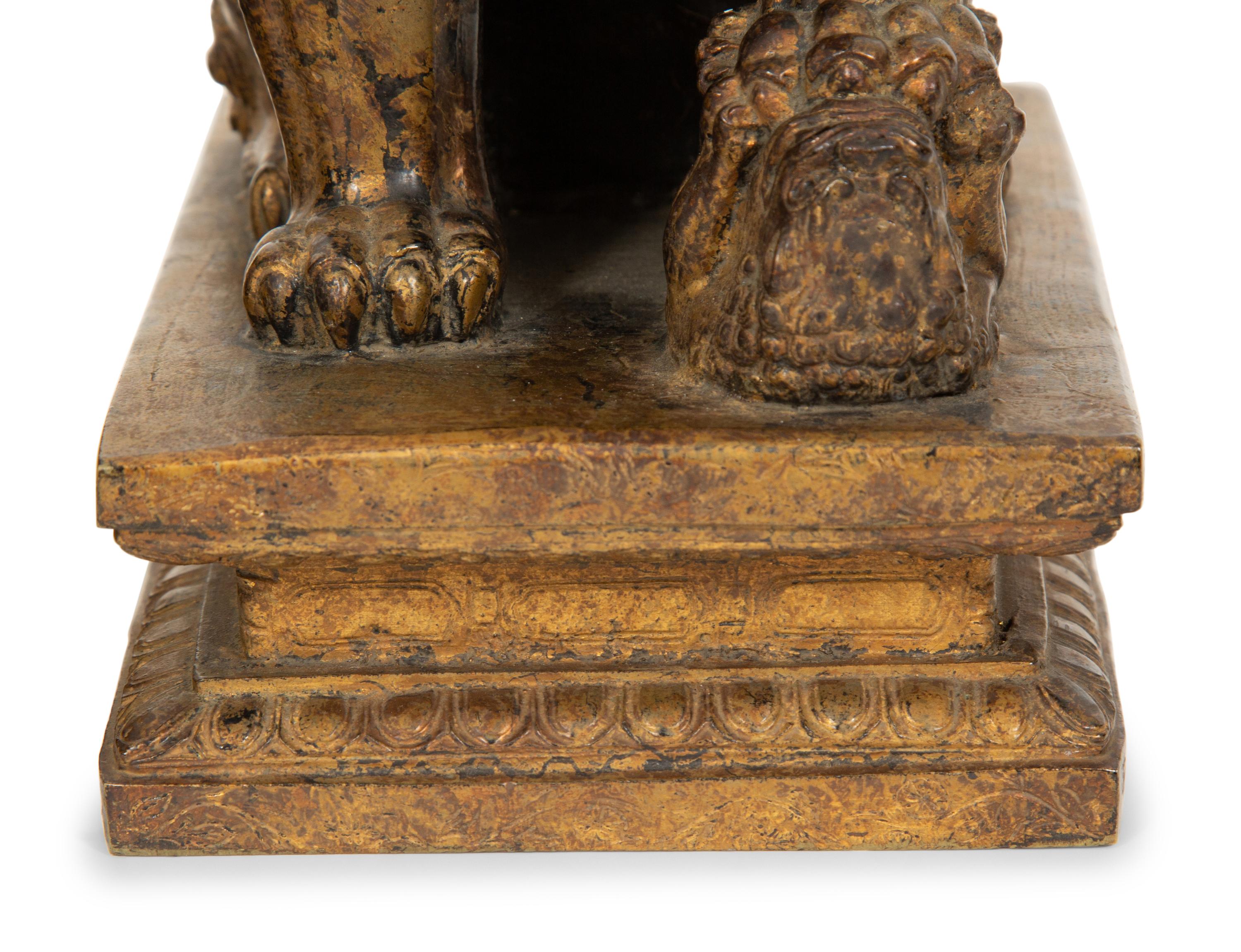 A Pair of Gilt Bronze Fu Lions