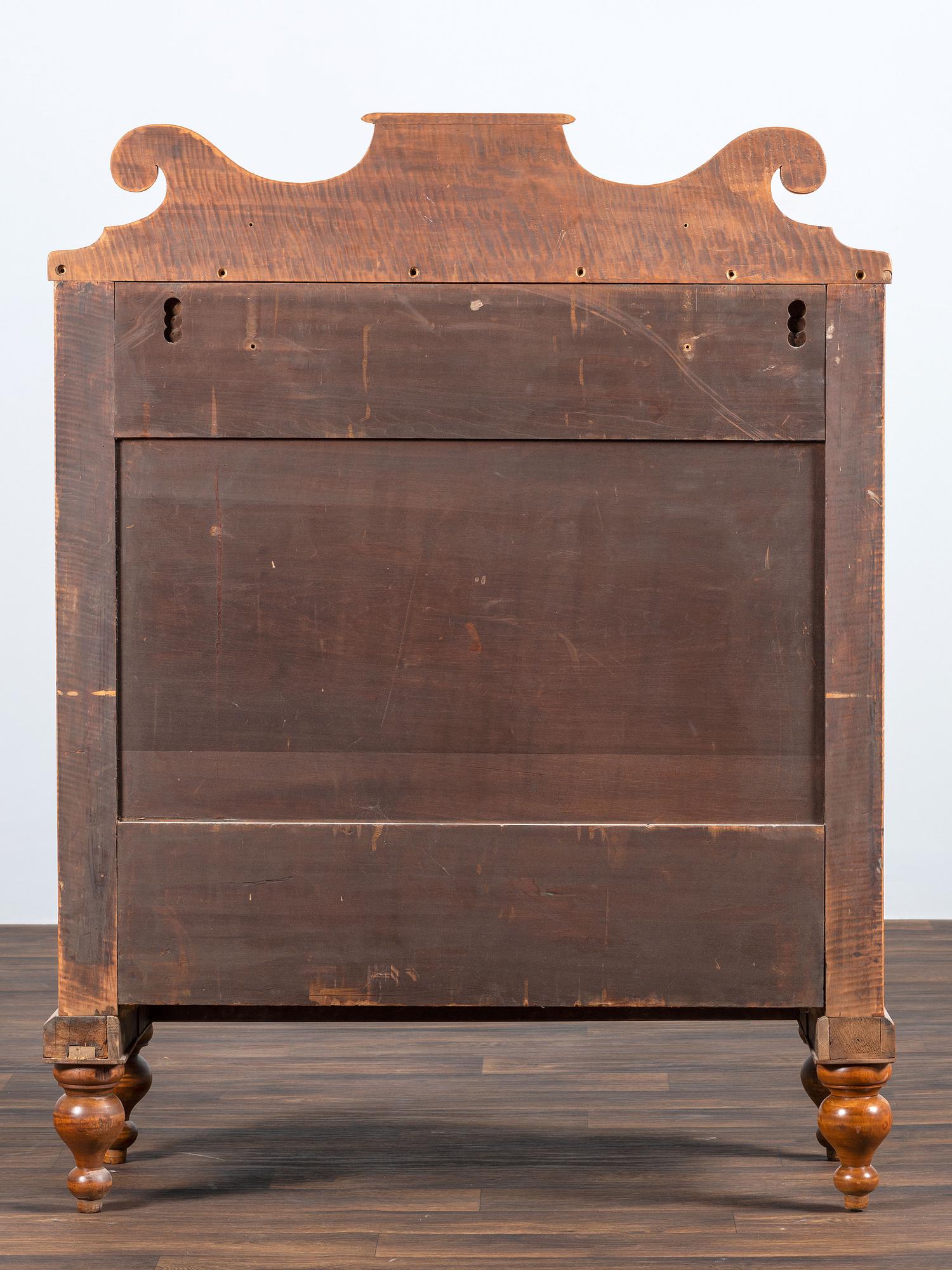 A Late Federal Tiger Maple Chest of Drawers
