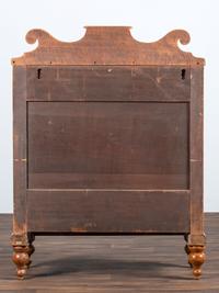 A Late Federal Tiger Maple Chest of Drawers