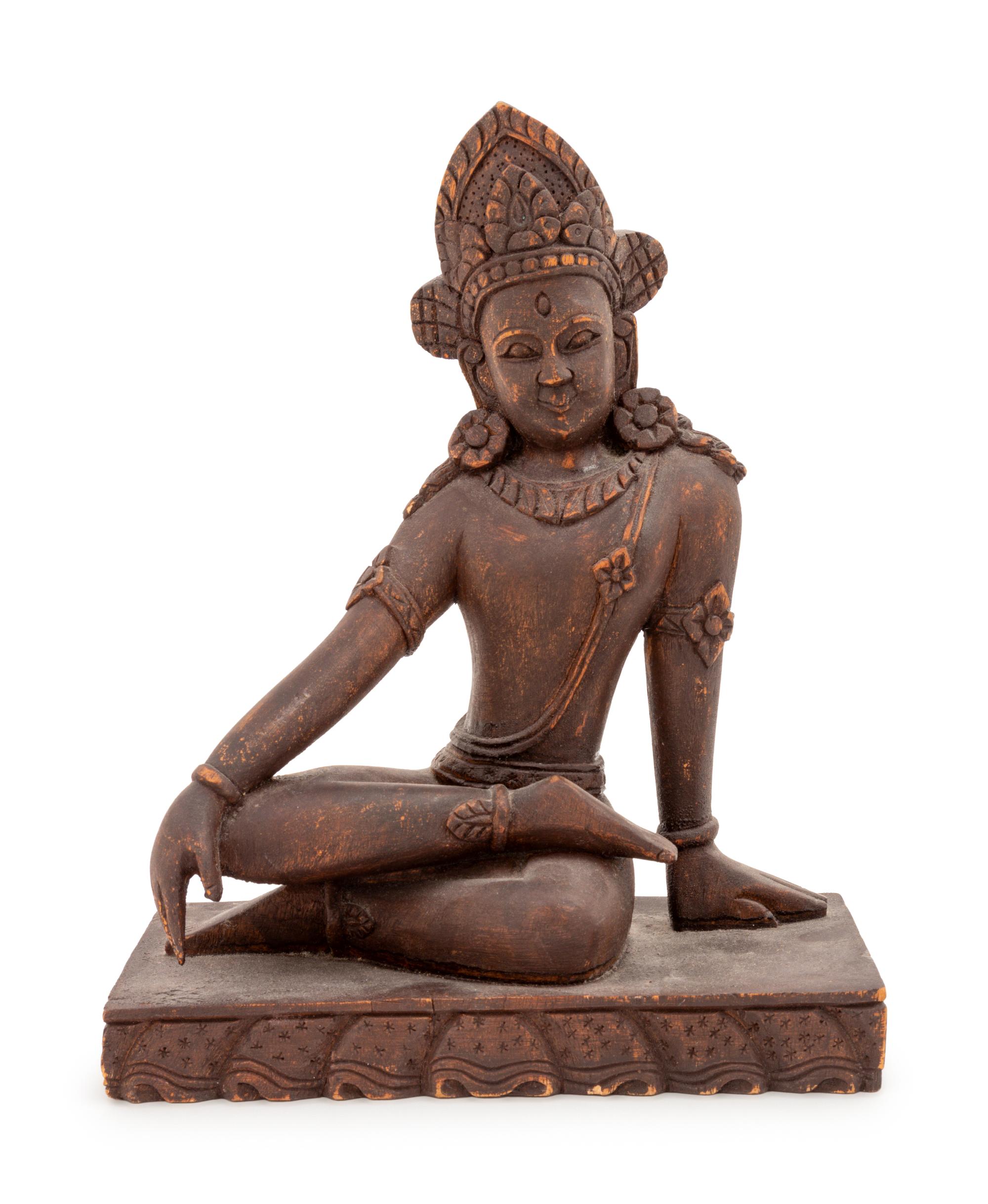 An Indian Carved Wood Figure of a Seated Deity
