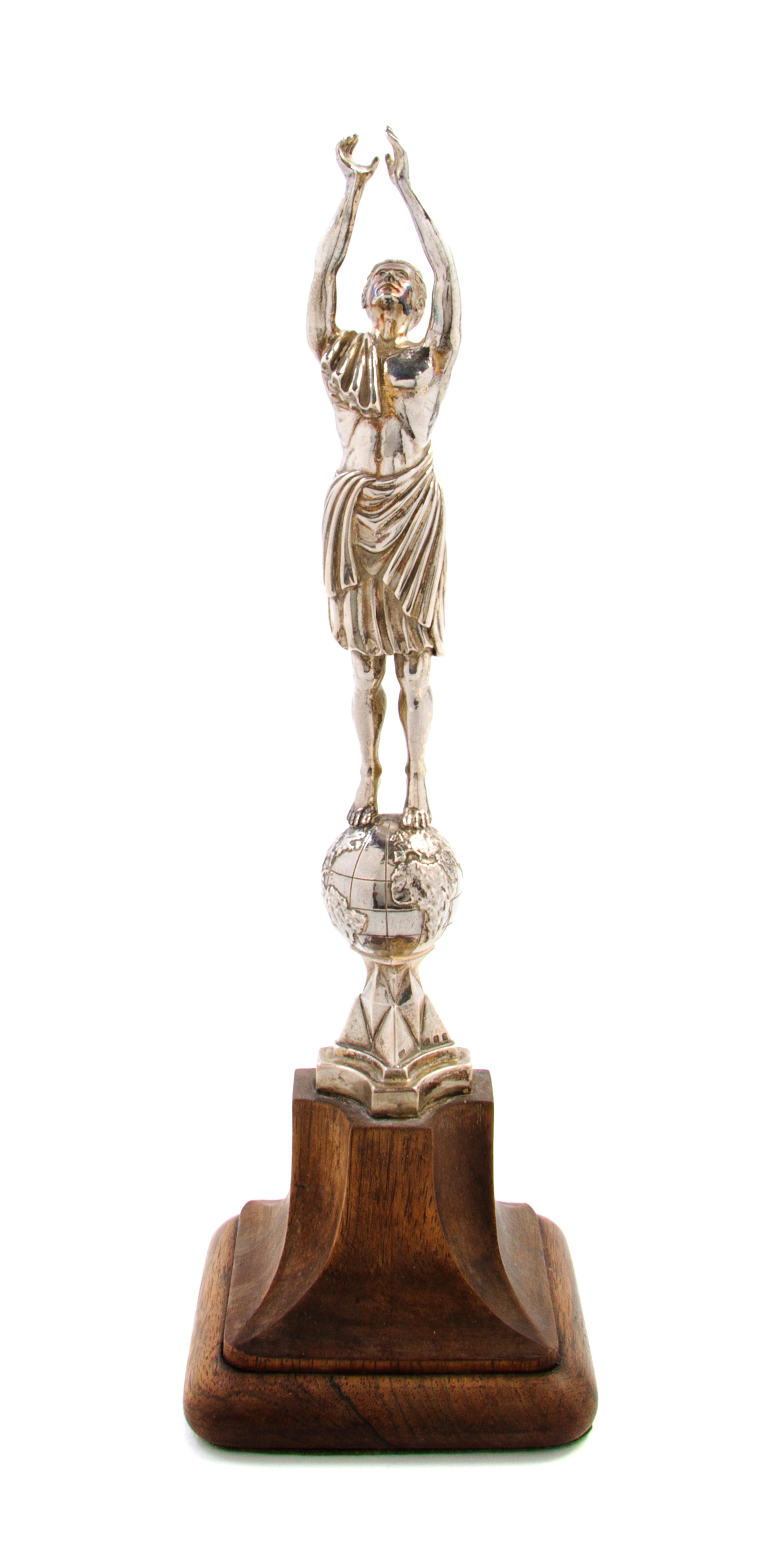 A George V Silver Ornament, Omar Ramsden, London, 1930, in the form of a classical robed gentleman with arms outstretched over his head