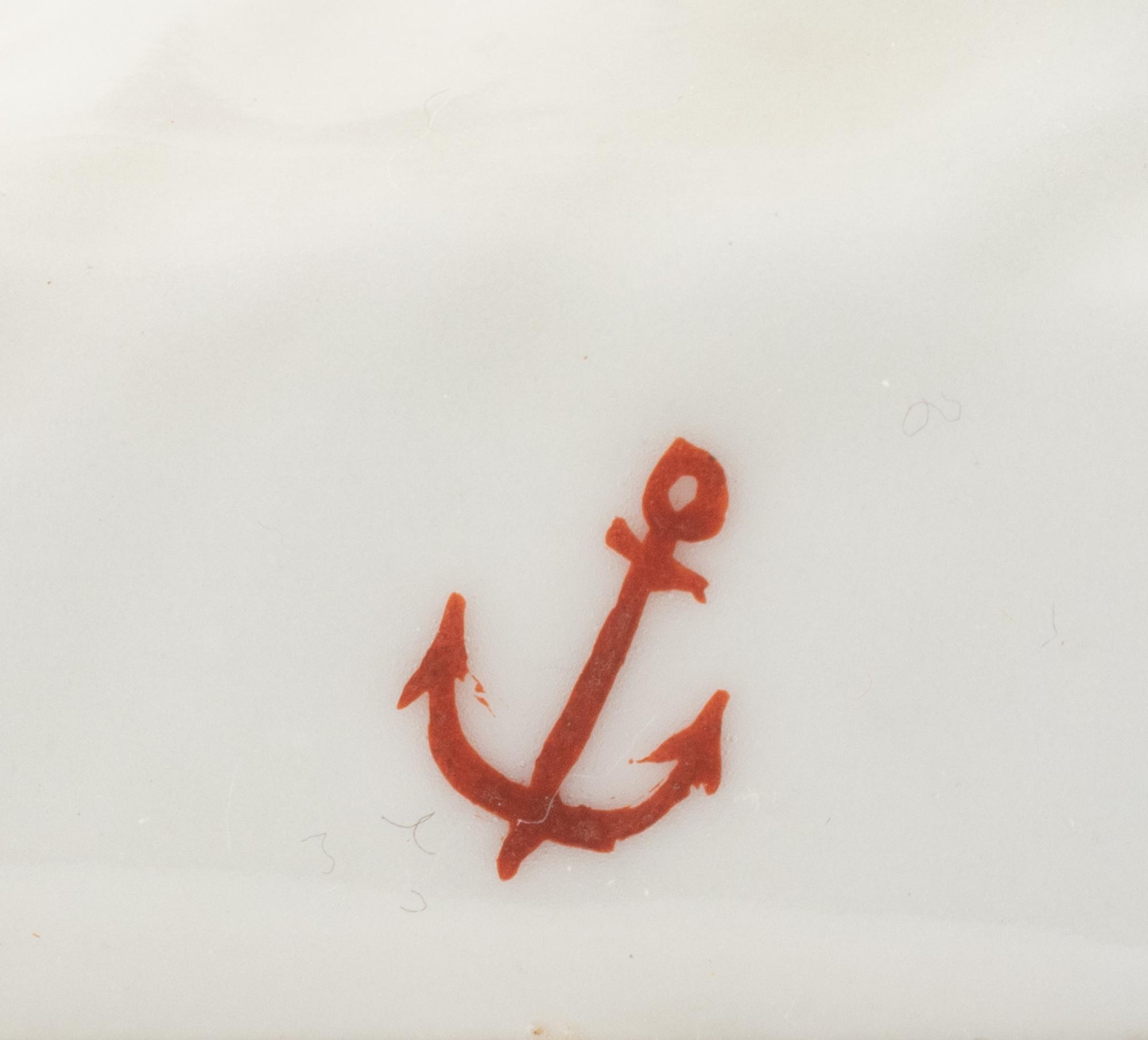 A Chelsea Porcelain Harlequin Figure
