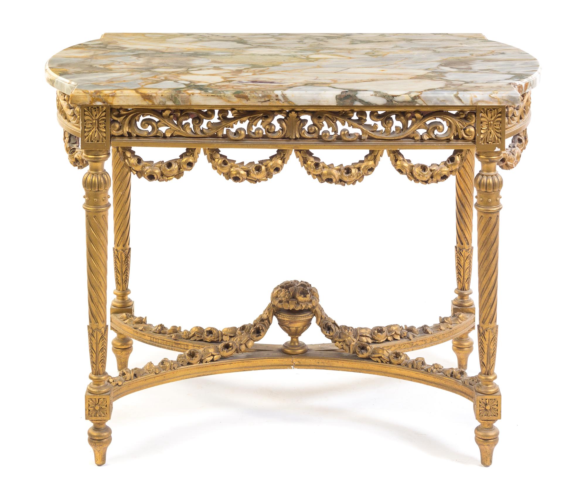 A Louis XVI Style Giltwood Center Table Height 30 x width 39 1/2 x depth 24 inches.