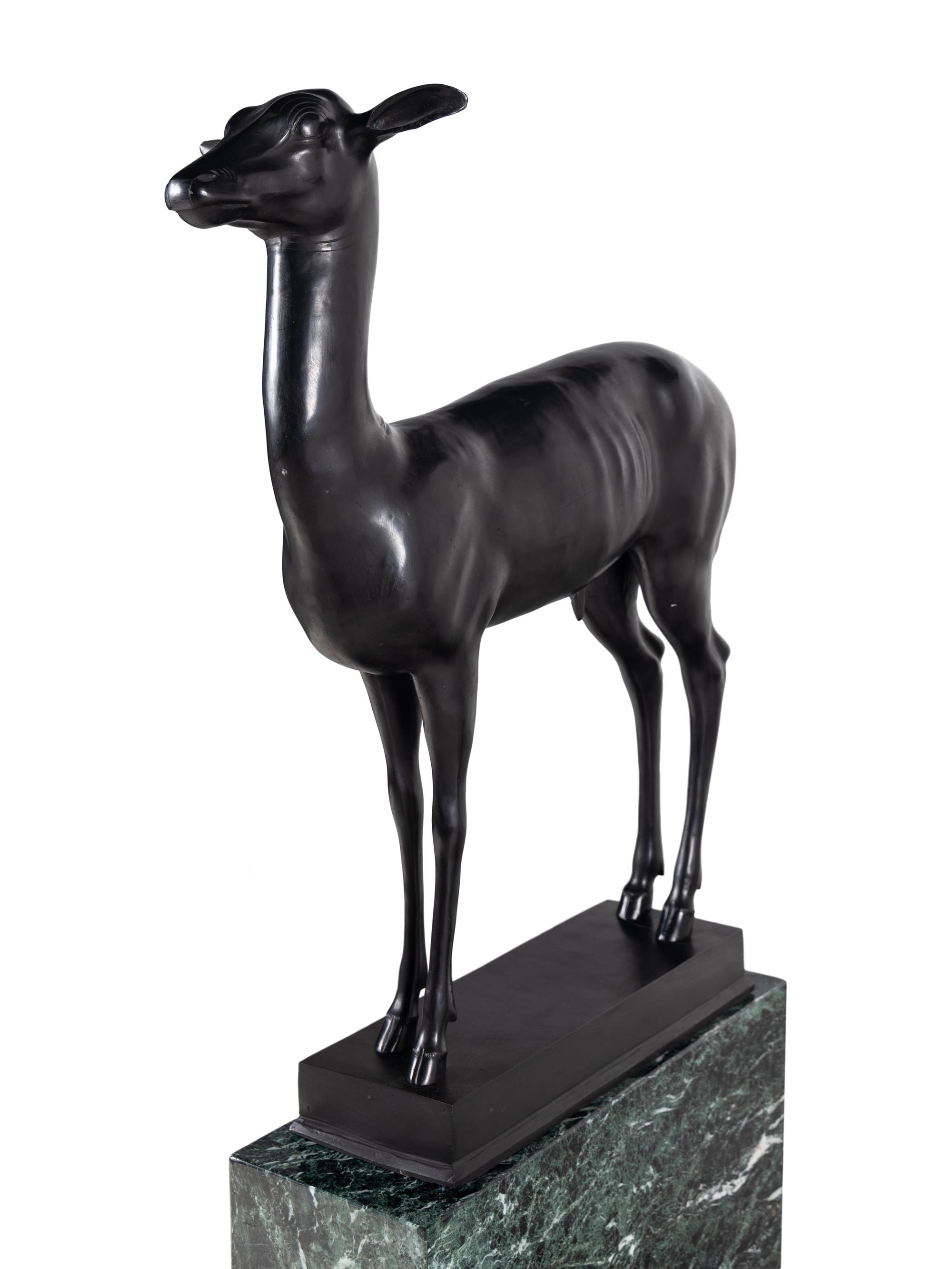 A Pair of Bronze Models of Pompeiian Deer on Marble Plinths