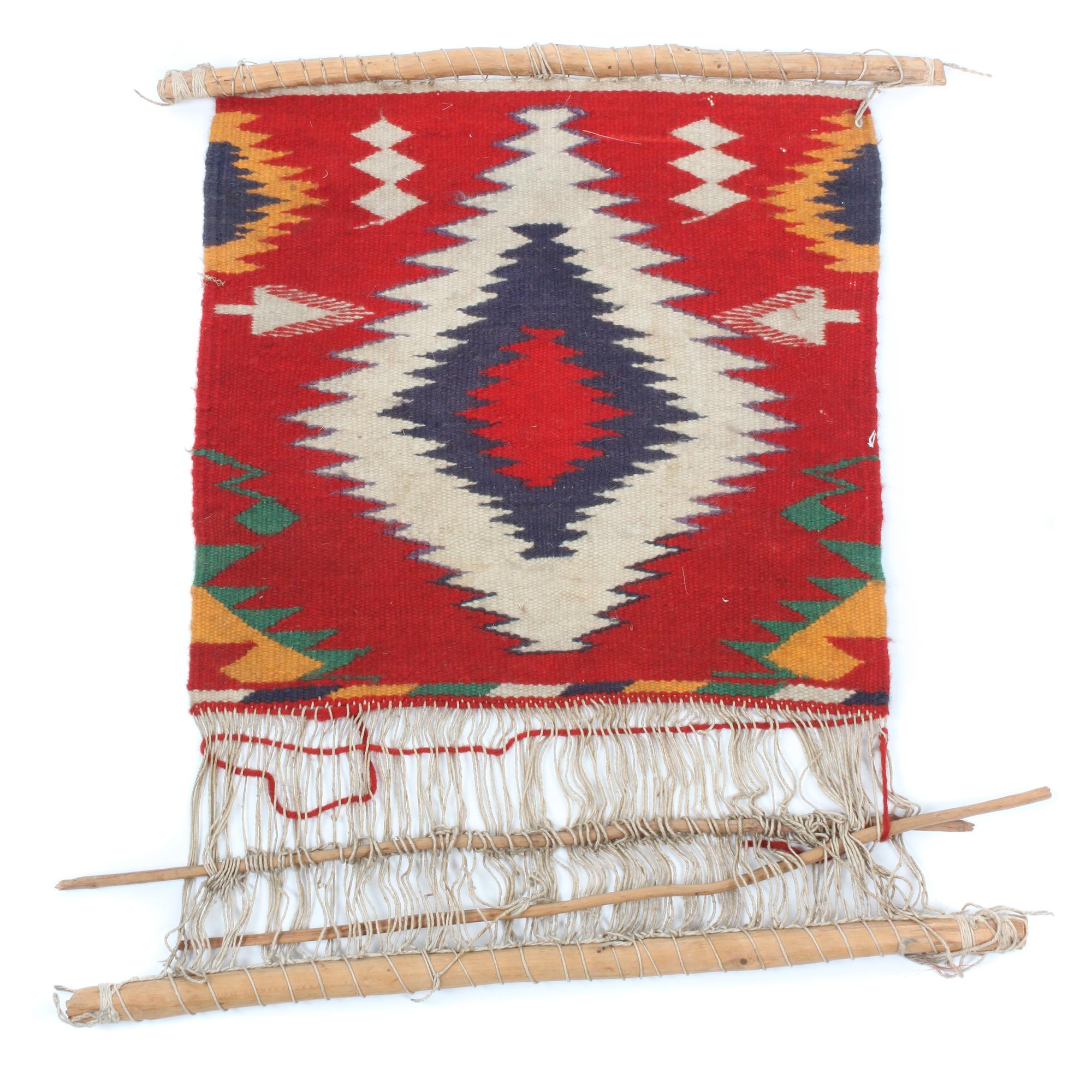 Three Navajo Weavings on Looms Height of largest loom 27 x width 43 3/4 inches.