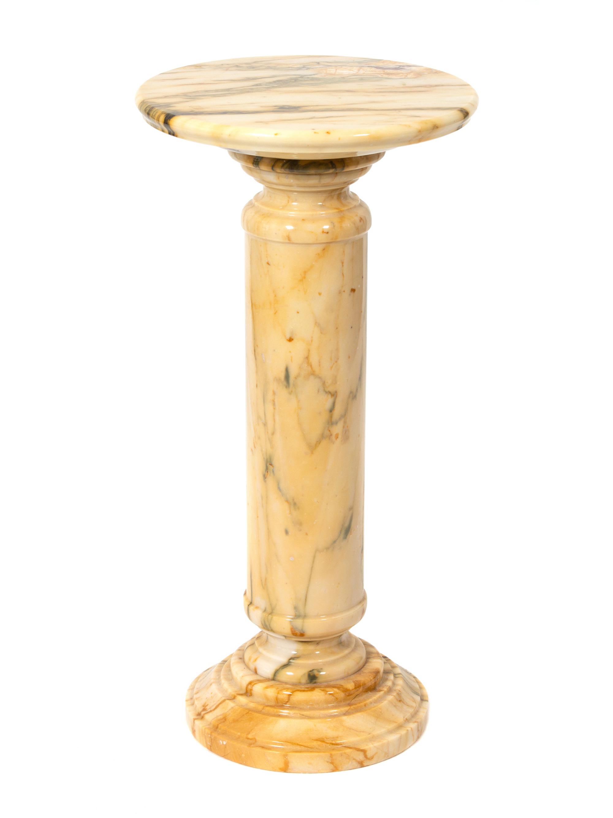 A Cream/Black/Brown Marble Columnar Pedestal — 20TH CENTURY