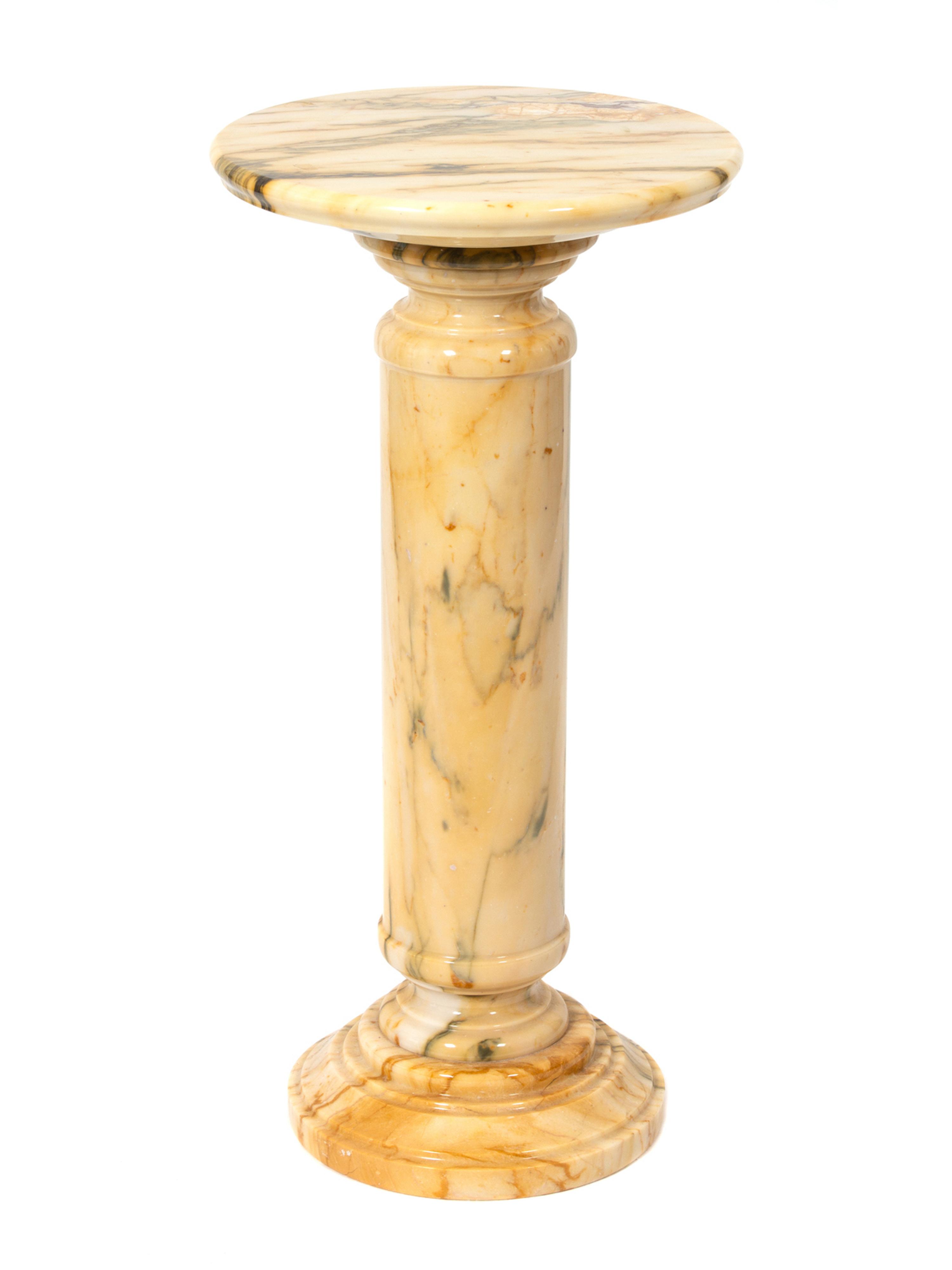 A Cream/Black/Brown Marble Columnar Pedestal — 20TH CENTURY
