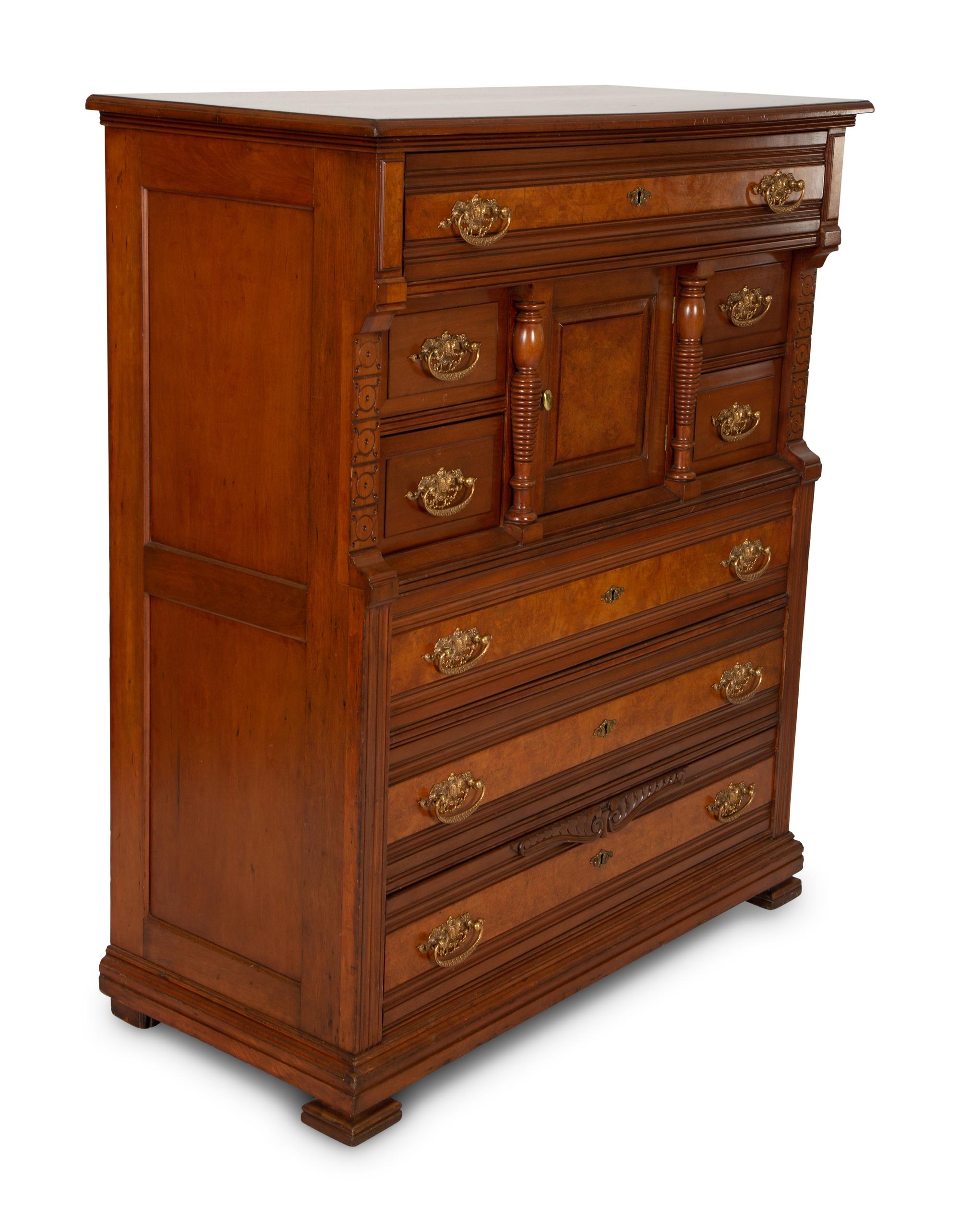 A Victorian Burl Inlaid Mahogany Chest of Drawers