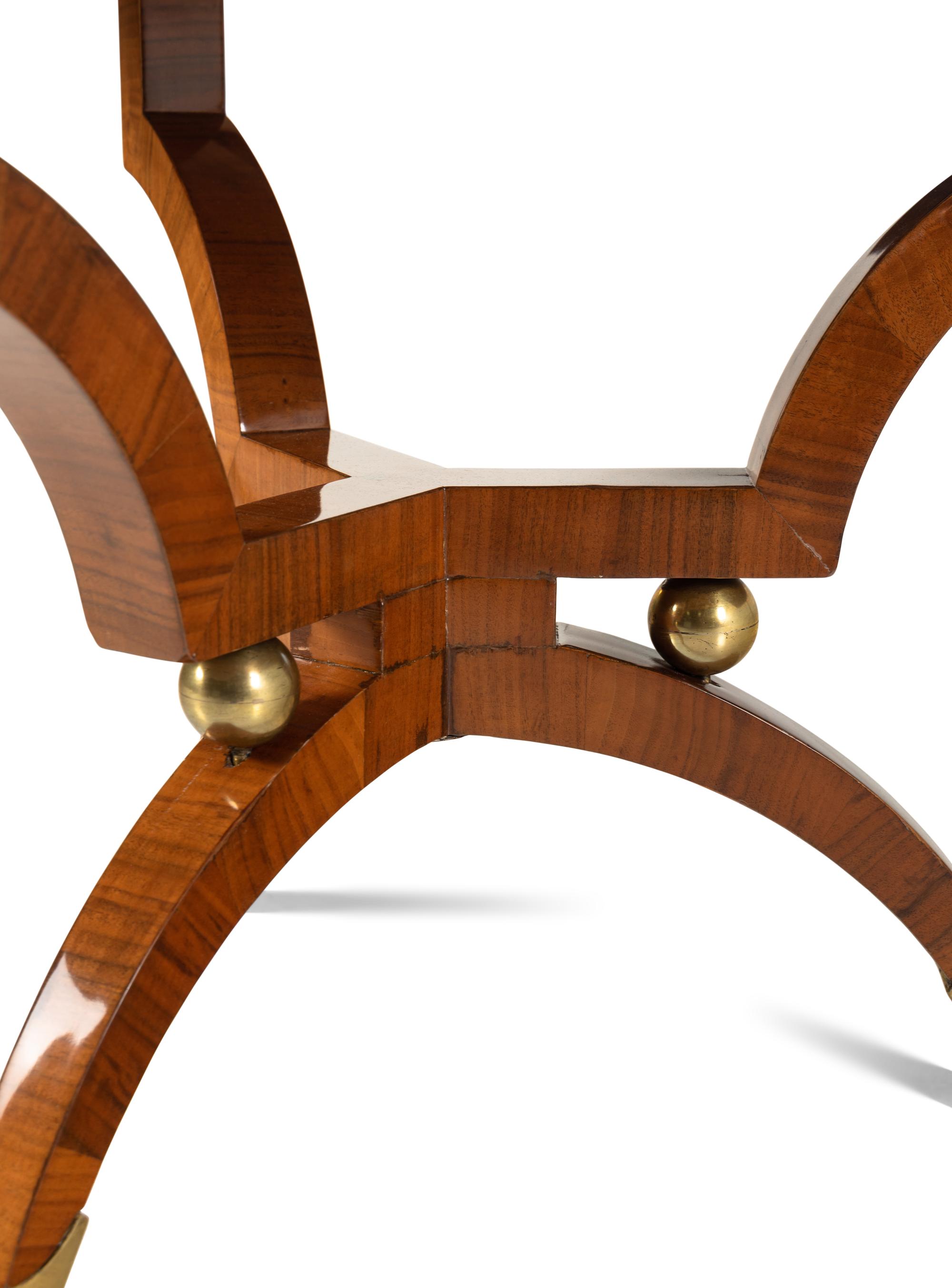 A Continental Brass Mounted Radially-Veneered Center Table