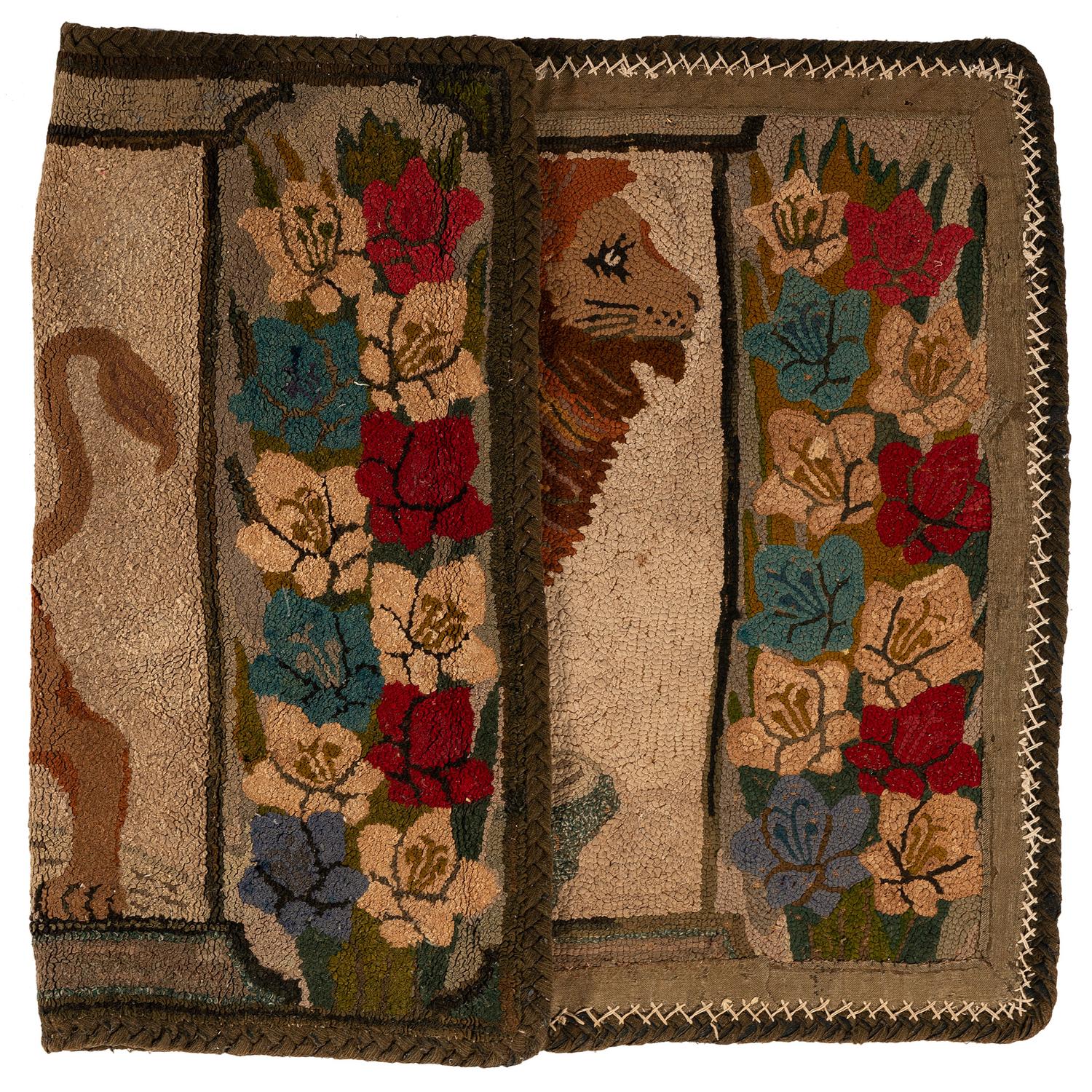 A Hooked Rug with a Lion and Floral Border