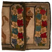 A Hooked Rug with a Lion and Floral Border
