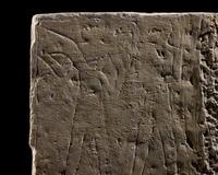 An Egyptian Limestone Relief Fragment Depicting an Offering Scene