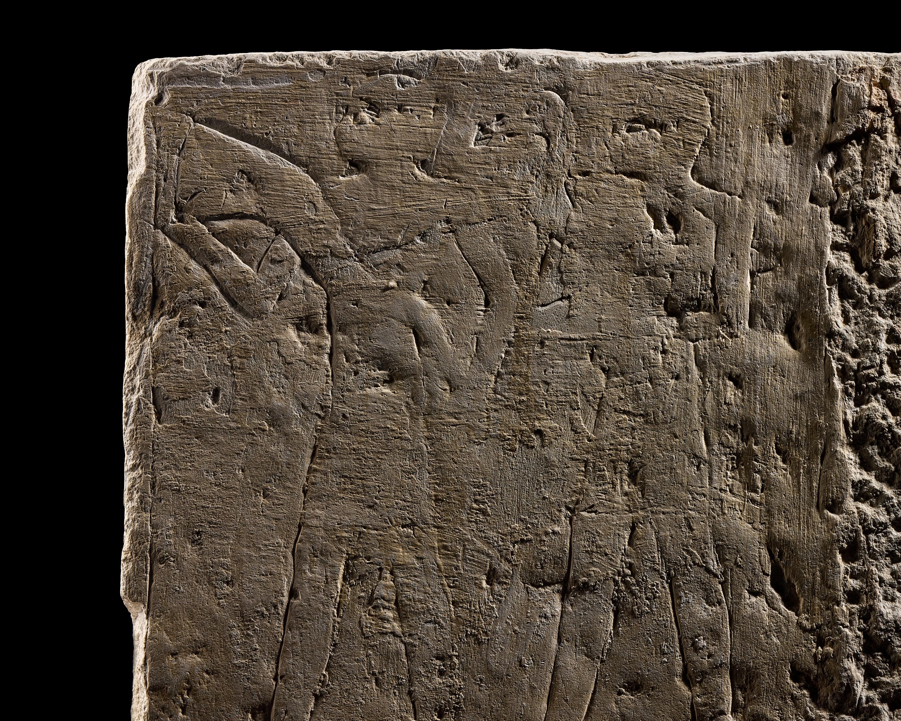 An Egyptian Limestone Relief Fragment Depicting an Offering Scene