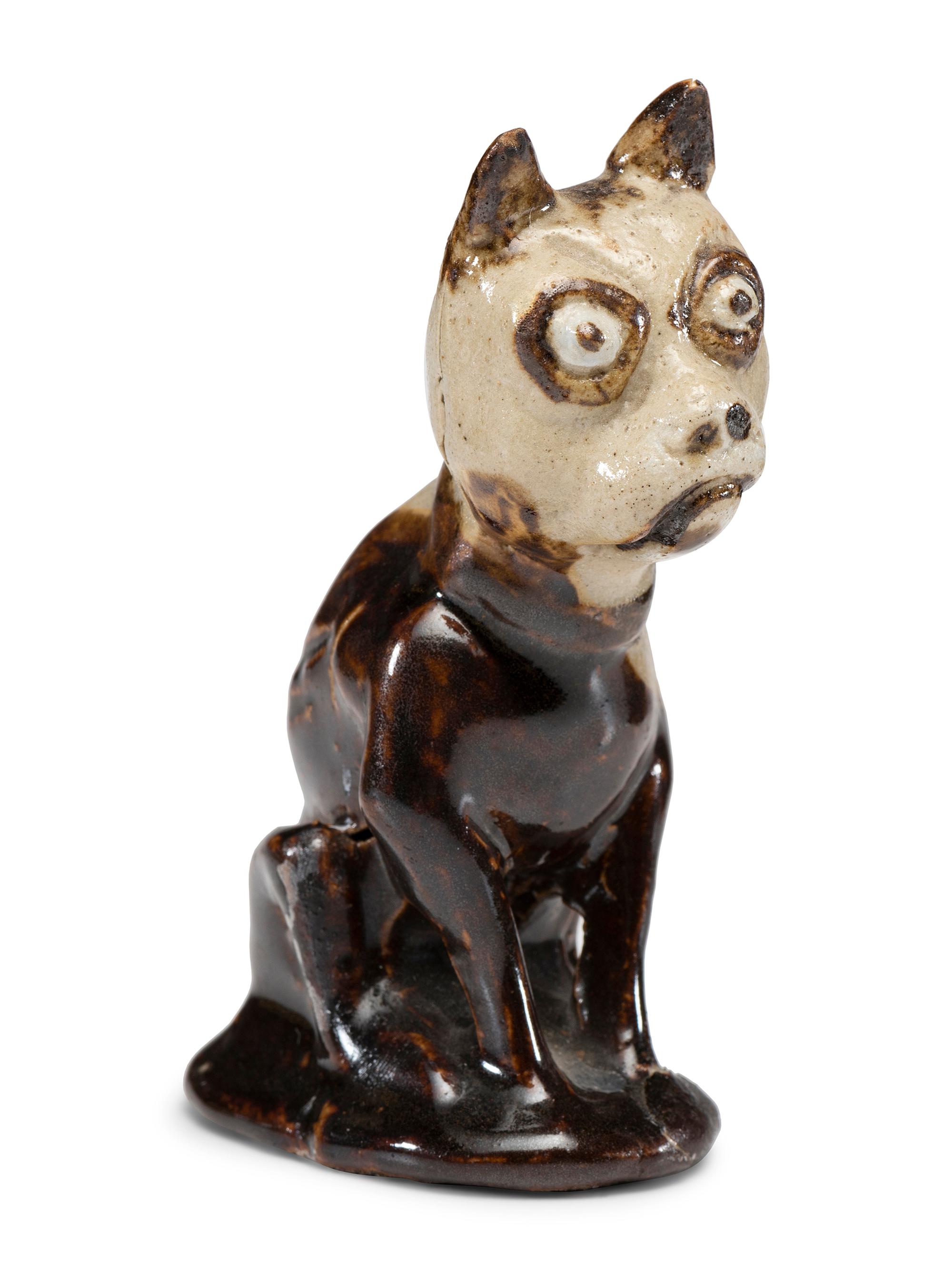 A Group of Ceramic Dogs