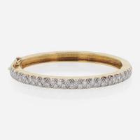 An 18K Gold and Diamond Bangle Bracelet by Carl D. Lindstrom & Sons